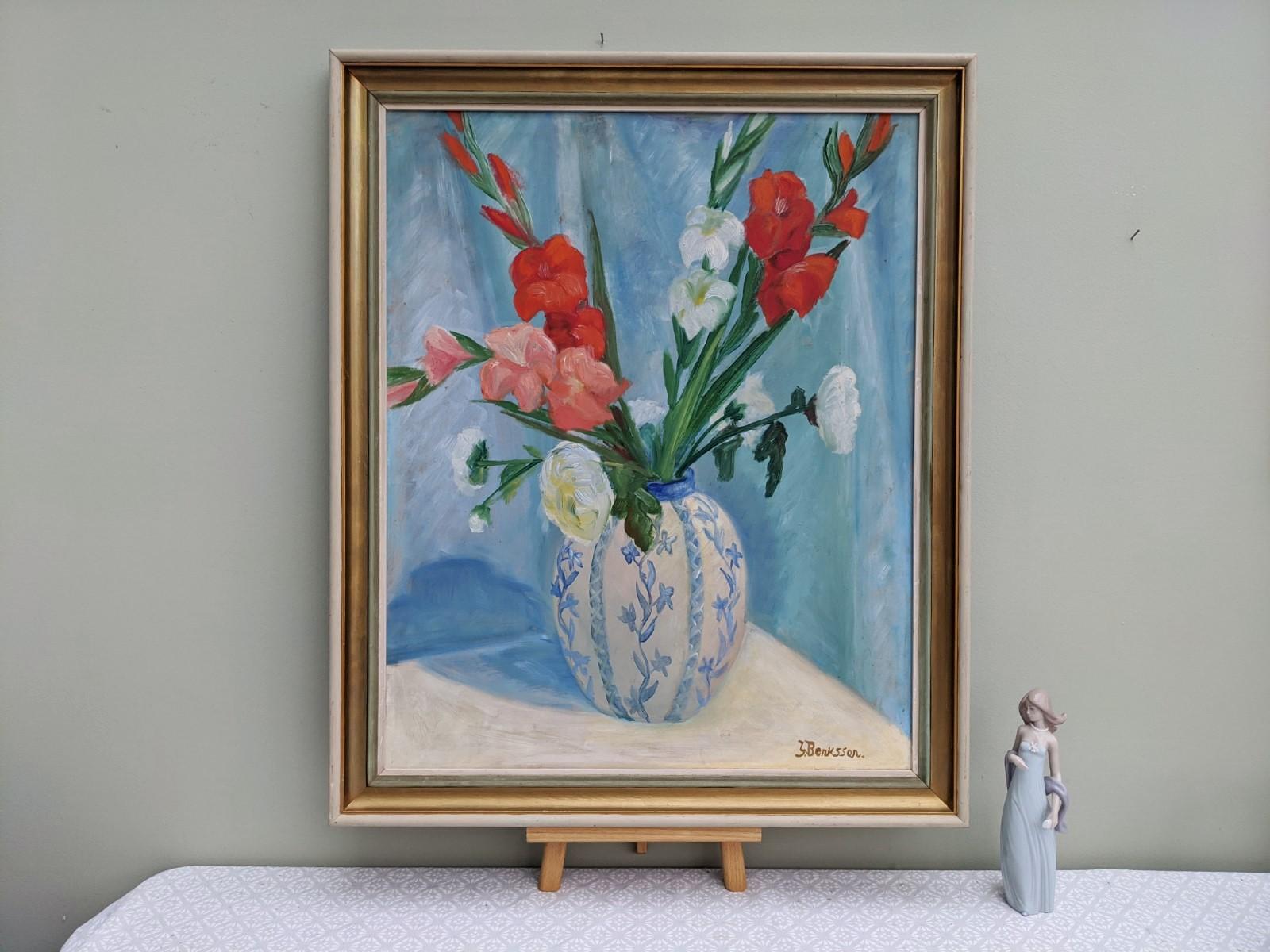 SHANGHAI BLOSSOM
Size: 69 x 57cm (including frame)
Oil on board

A gorgeous and bright floral still life painted in oil onto board. Red and white blooms sit within a delicate blue and white ceramic vase, all set against a painted sky blue