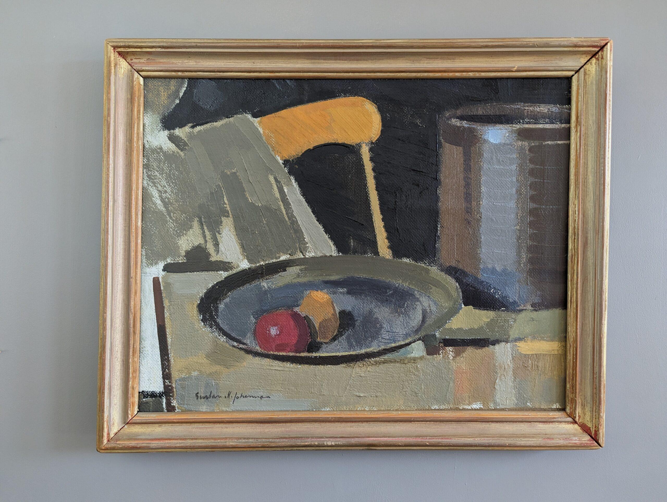 EXPECT
Size: 43 x 53 cm (including frame)
Oil on Canvas 

A mid-century modernist style interior still life painting that captures a moment of tranquil elegance, executed in oil onto canvas.

Centered on a table rests a plate of fruit, featuring a