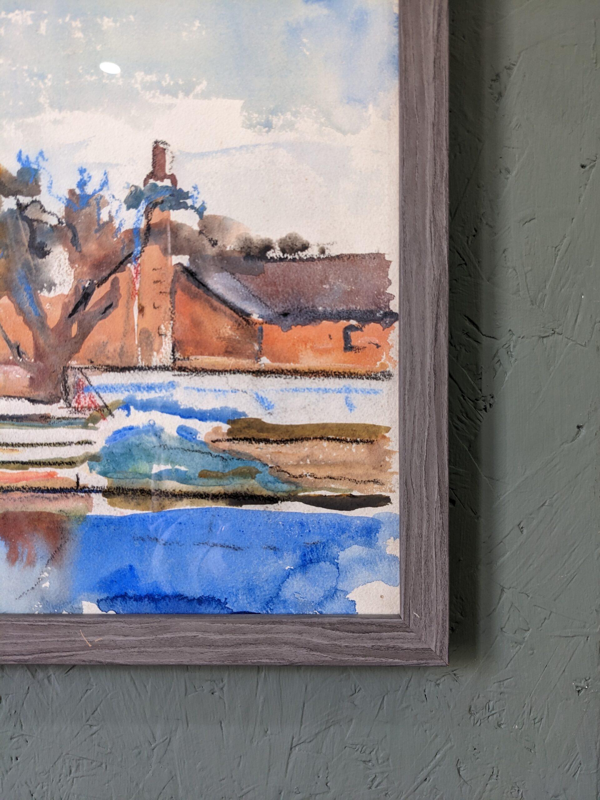 The Waterway
Size: 43.2 x 31.7cm (including frame)
Watercolour

A calm and tranquil watercolour artwork that would stand out in any interior.

A waterway is presented in front of a row of houses in a suburban neighbourhood. The sky is blue, and in