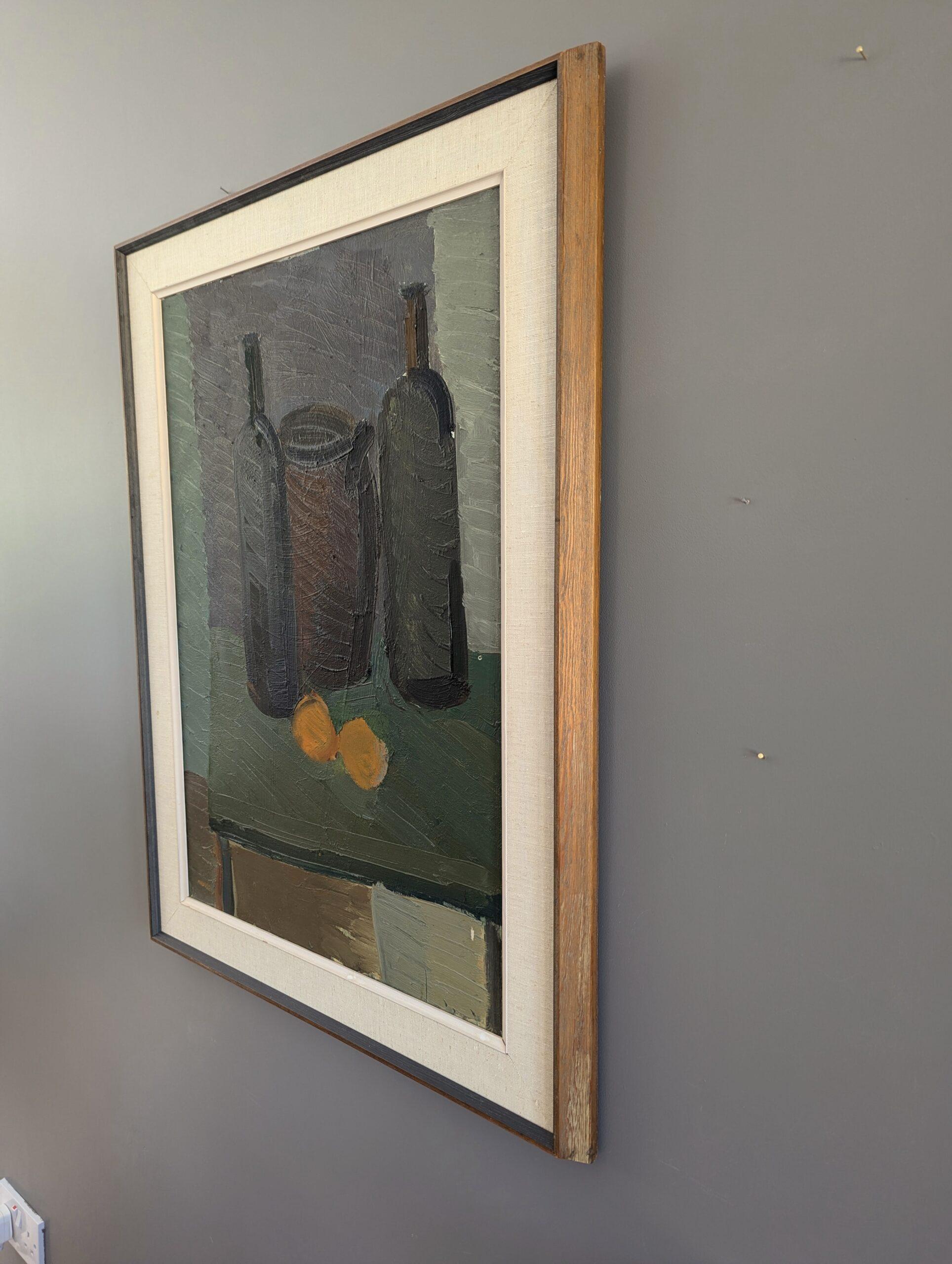 DOS NARANJAS
Óleo sobre lienzo
Tamaño: 80 x 60 cm (incluido el marco)

Un bodegón modernista de mediados de siglo brillantemente ejecutado al óleo, pintado sobre lienzo.

Colores profundos y terrosos componen esta paleta tenue, compuesta por un trío