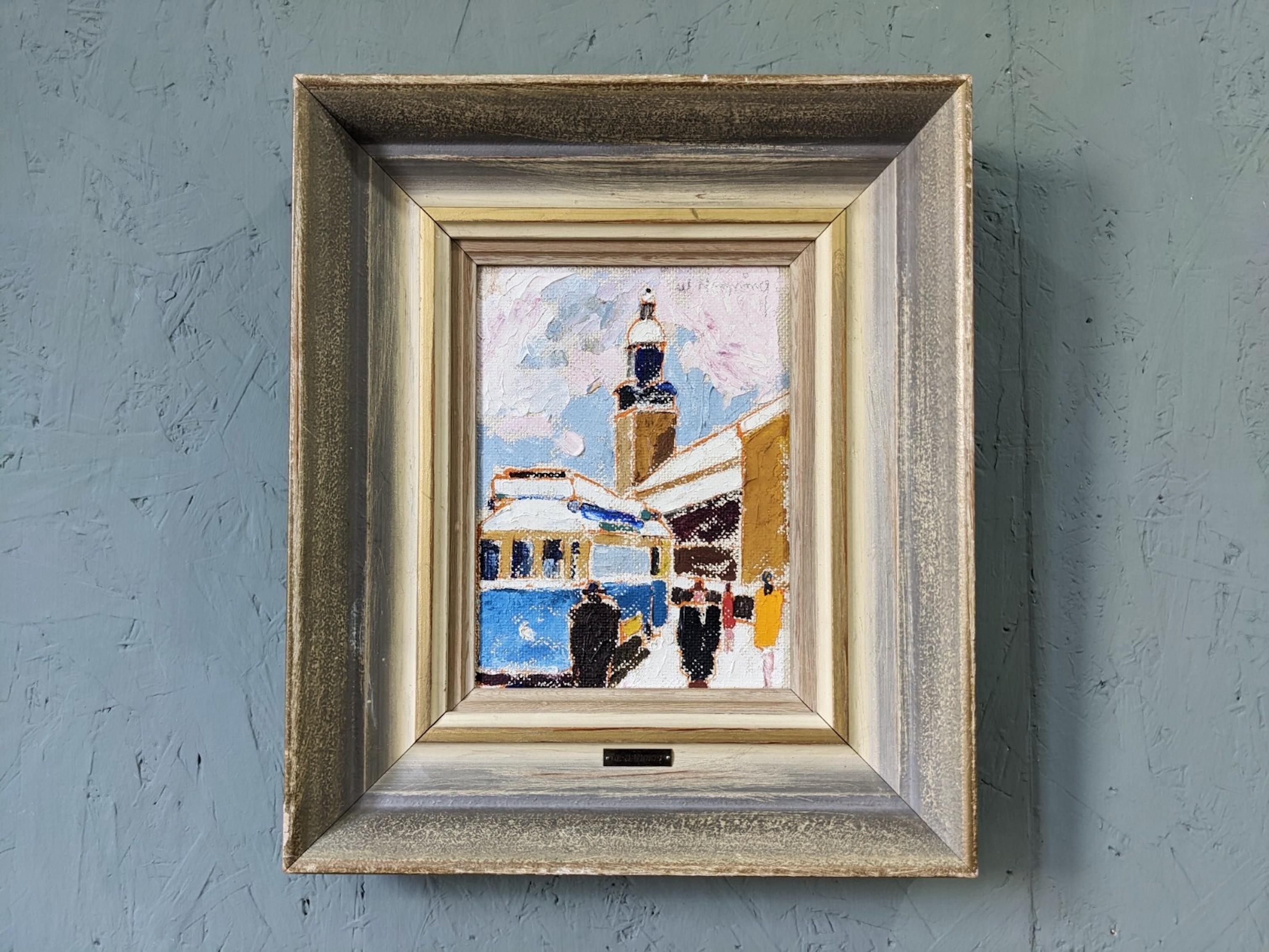 TRAM STOP
Size: 35 x 30 cm (including frame)
Oil on Board

A small yet very striking modernist street scene composition, executed in oil onto board.

The painting depicts a bustling scene in a city with a tram stopping on the left, figures lining a
