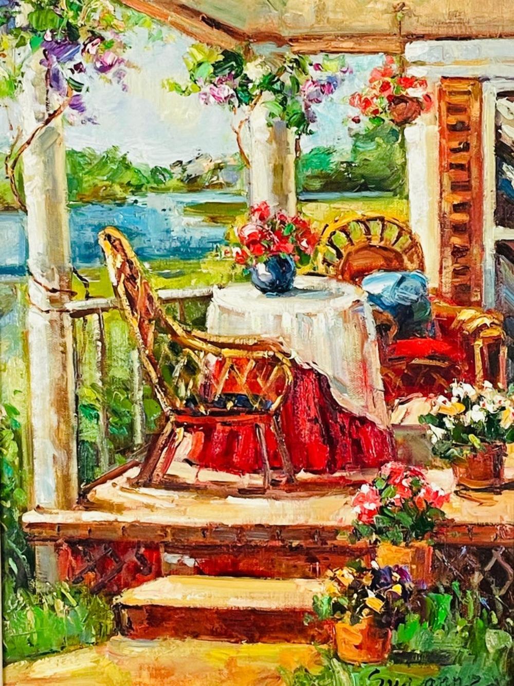 An 1980's gorgeous oil on canvas painting of a home porch. The painting depicting a view of an elegant country home deck by the lack. This beautiful painting is finely presented in a gilt custom frame and is signed Botton right by the artist