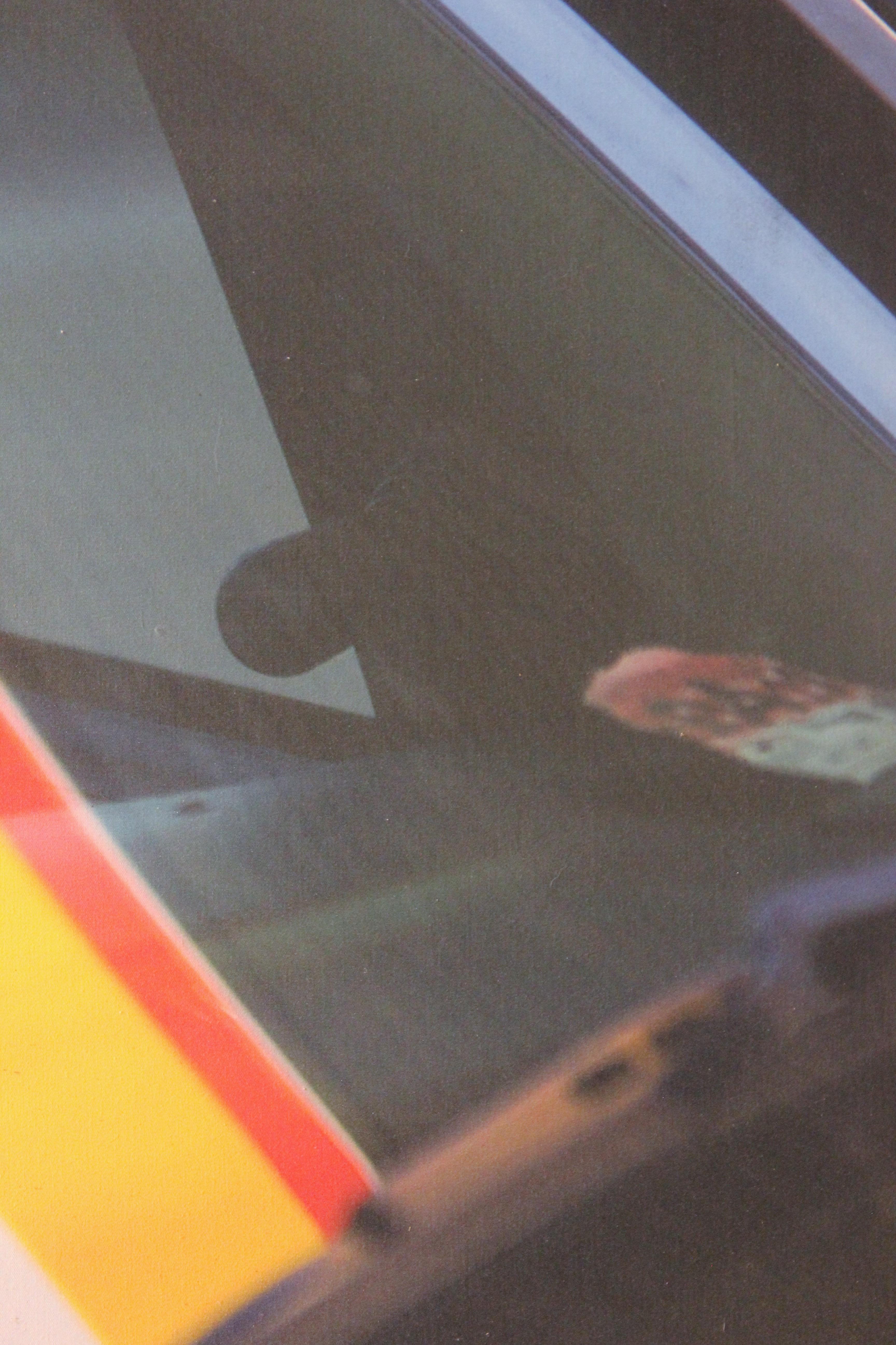 Abstract Photograph of a Close Up View of a Car Windshield with Reflection 3