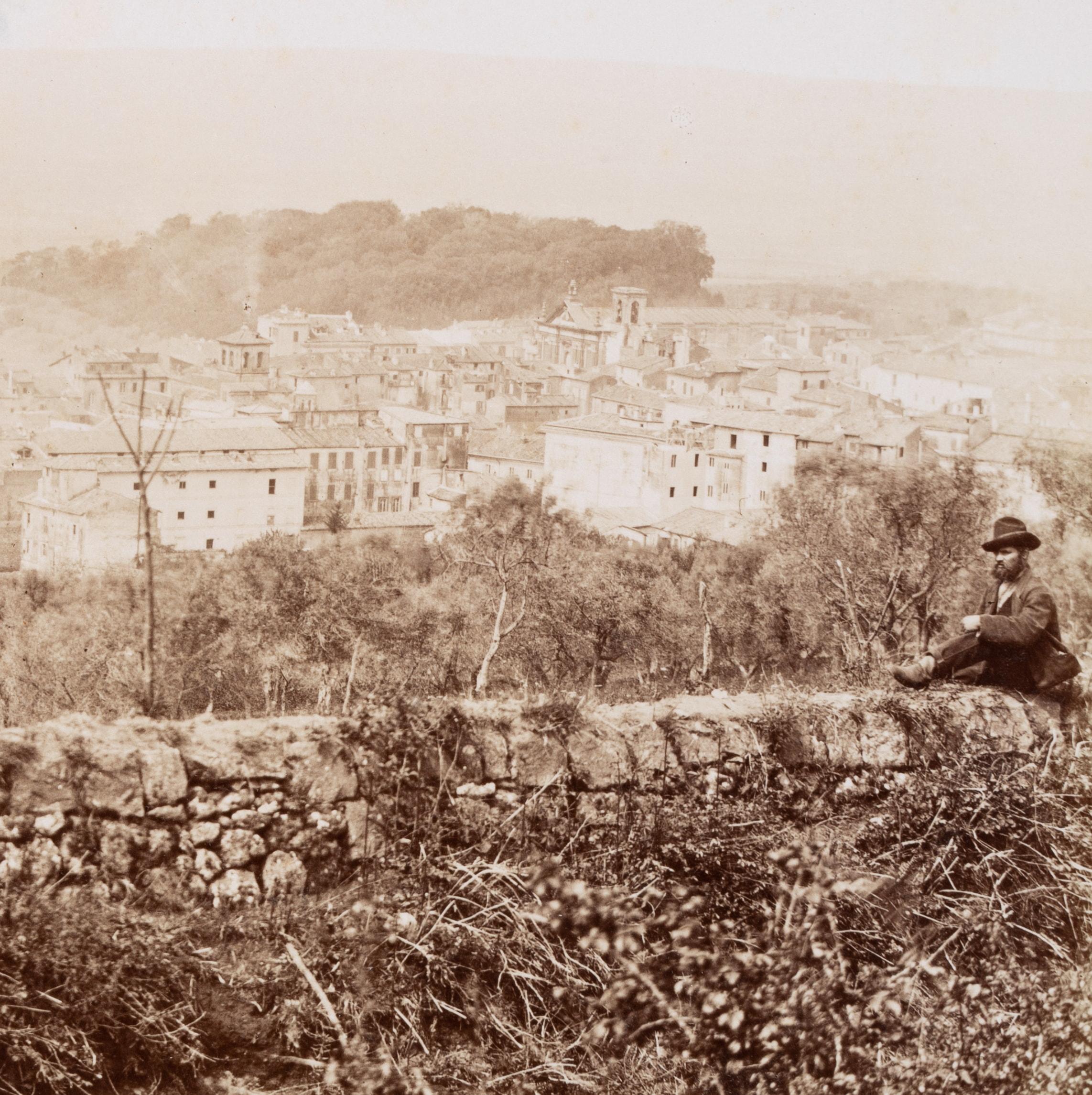 Domenico Anderson (1854 Rom - 1938 ibid.) Circle: View of the roofs of the town of Albano with wanderer sitting on a wall in the front of the picture, c. 1880, albumen paper print

Technique: albumen paper print, mounted on Cardboard

Inscription: