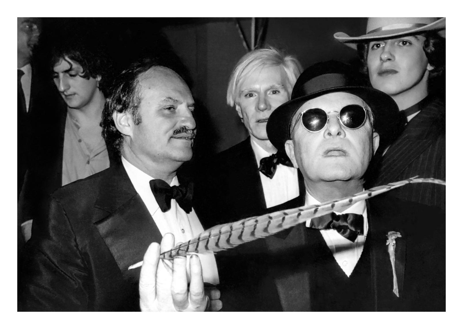 Andy Warhol and Truman Capote at Studio 54 24