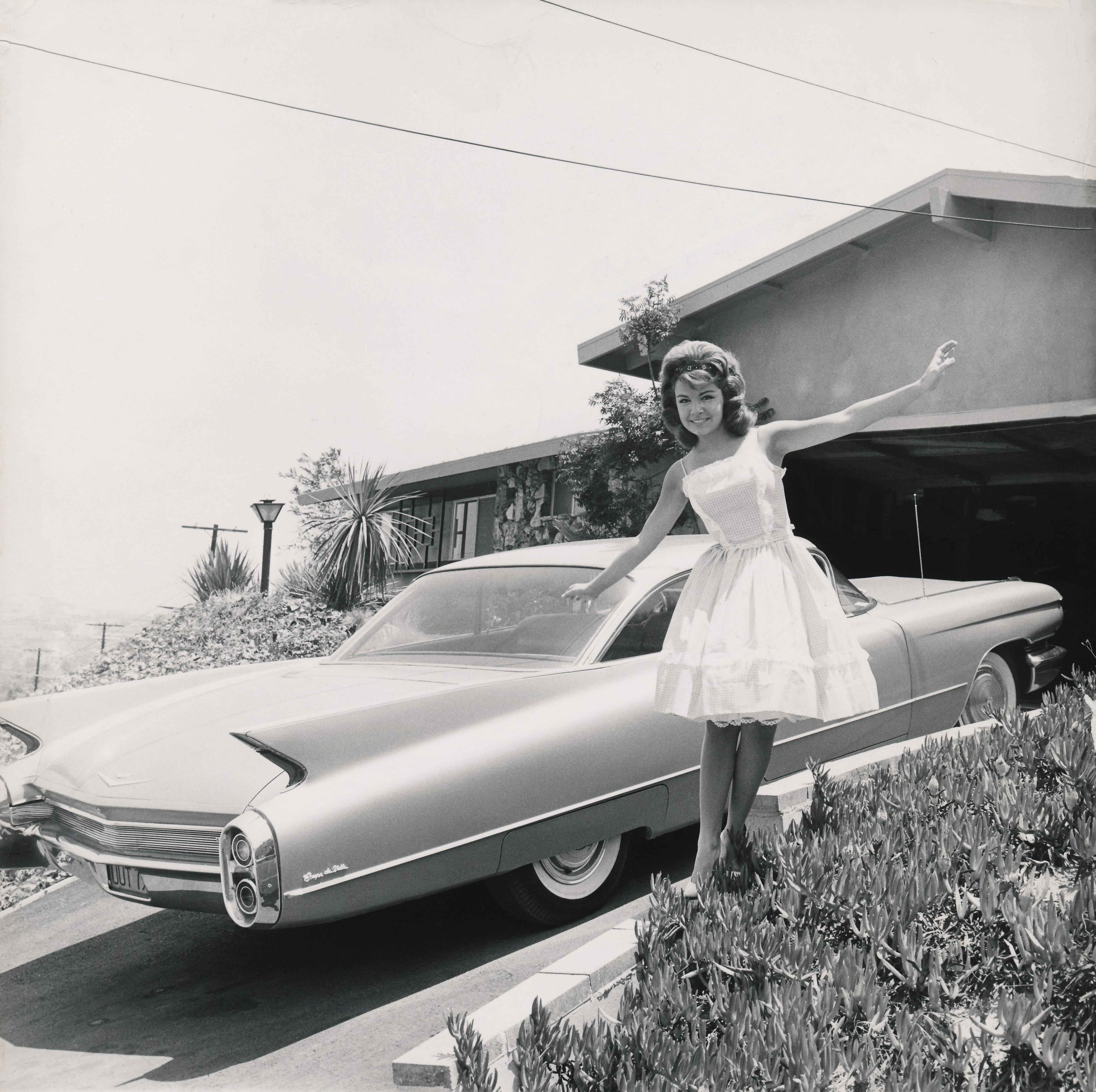 Unknown Portrait Photograph - Anette Funicello Waving with Classic Cadillac Fine Art Print