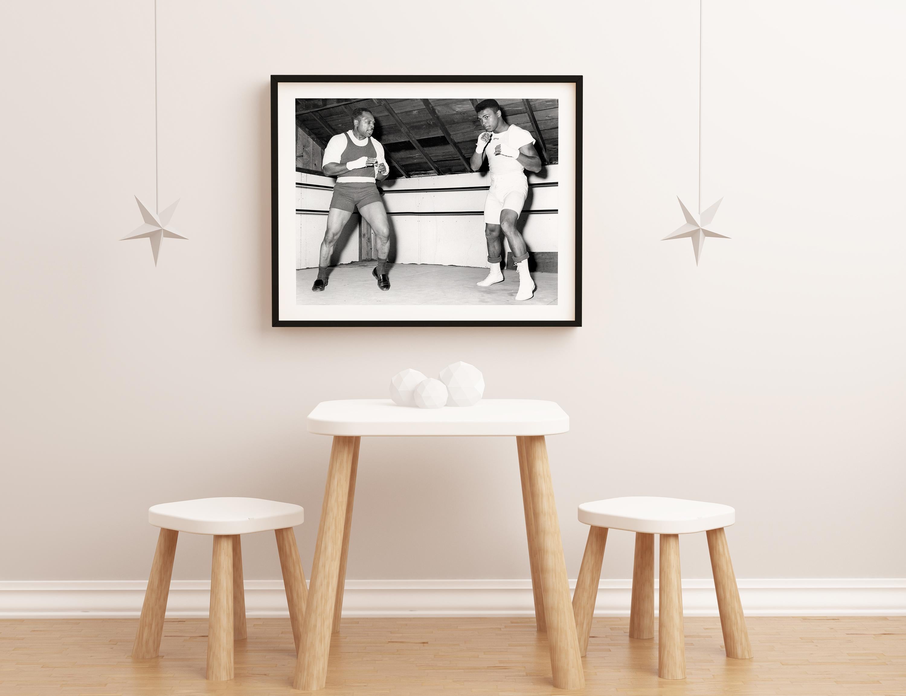 Archie Moore and Muhammad Ali at Archie Moore's Salt Mine Training Camp, near Ramona, California in 1957.

16” x 20”, edition of 125
Archival Pigment Print on Fiber-Based Paper
Produced from the original 8