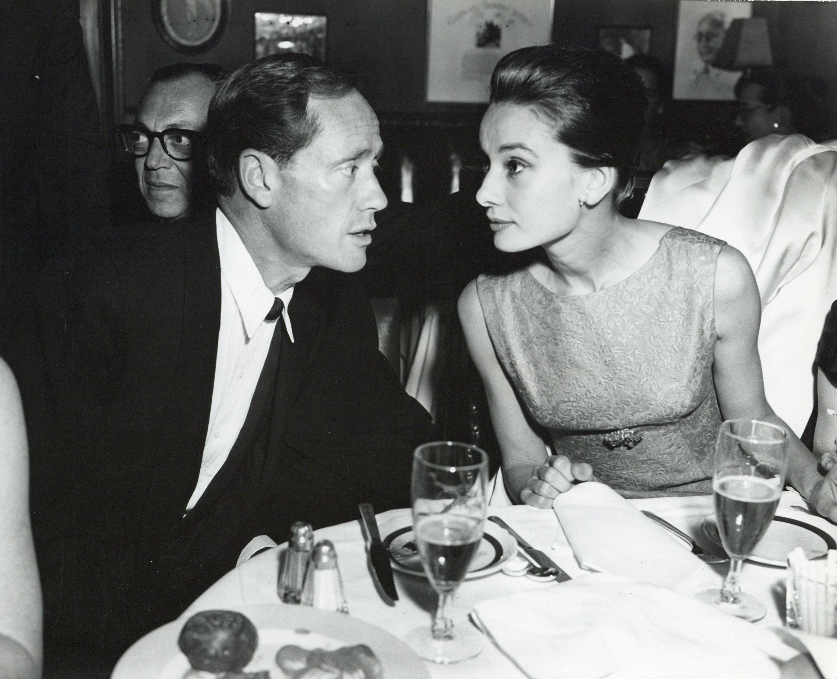 Unknown Black and White Photograph - Audrey Hepburn and Mel Ferrer Candid at Dinner Event Vintage Original Photograph