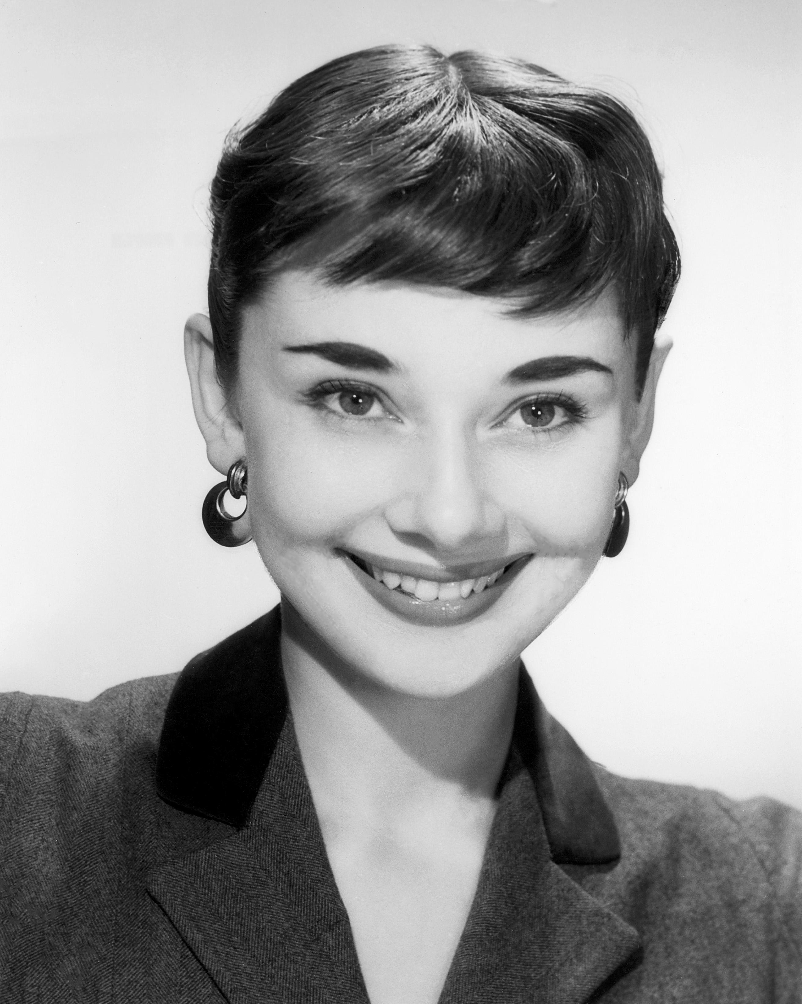 Unknown Black and White Photograph - Audrey Hepburn Big Smile in the Studio Globe Photos Fine Art Print