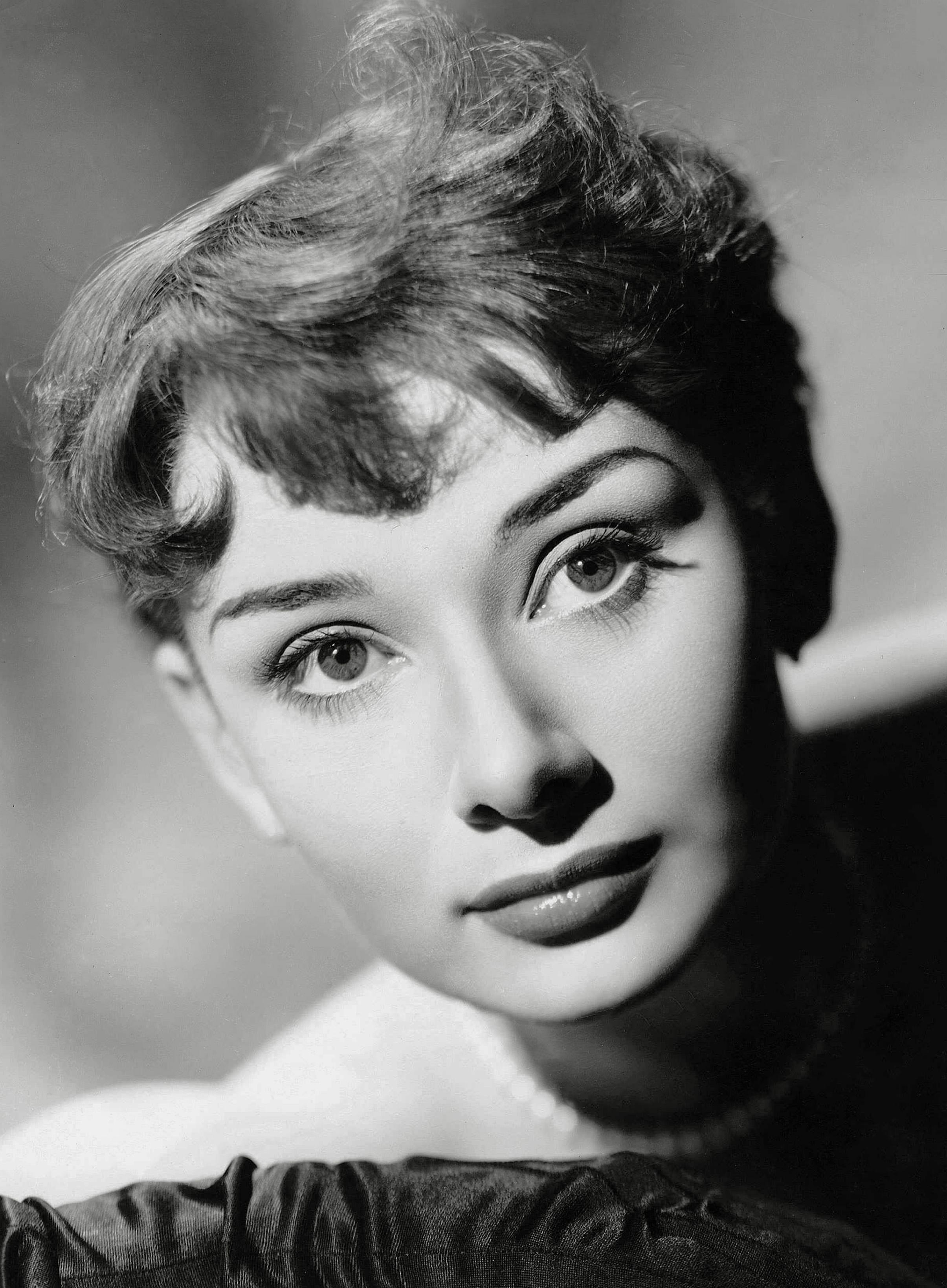 Unknown Black and White Photograph - Audrey Hepburn: Elegance in the Studio Globe Photos Fine Art Print
