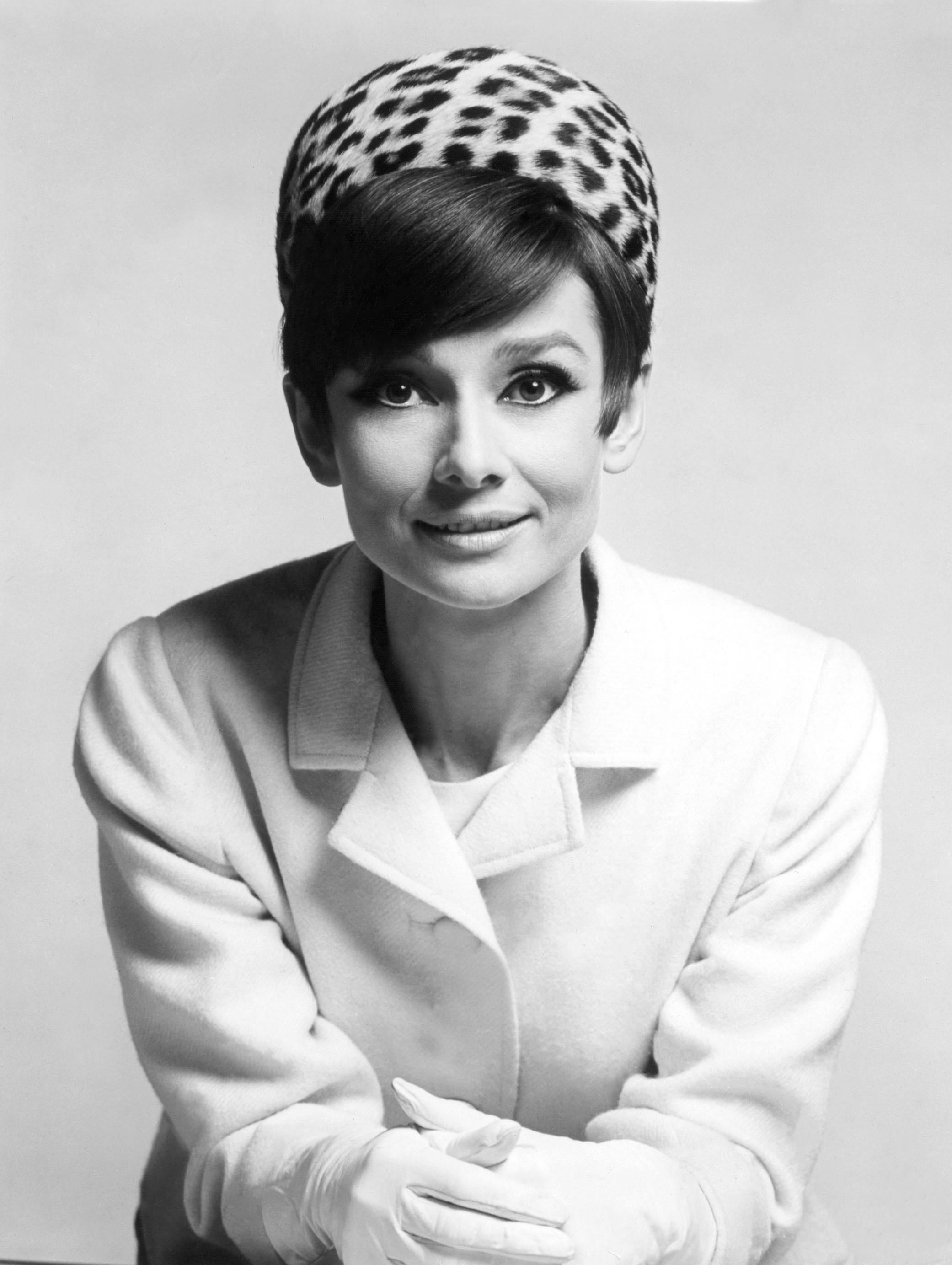 Unknown Portrait Photograph - Audrey Hepburn Smiling in Leopard Hat Globe Photos Fine Art Print