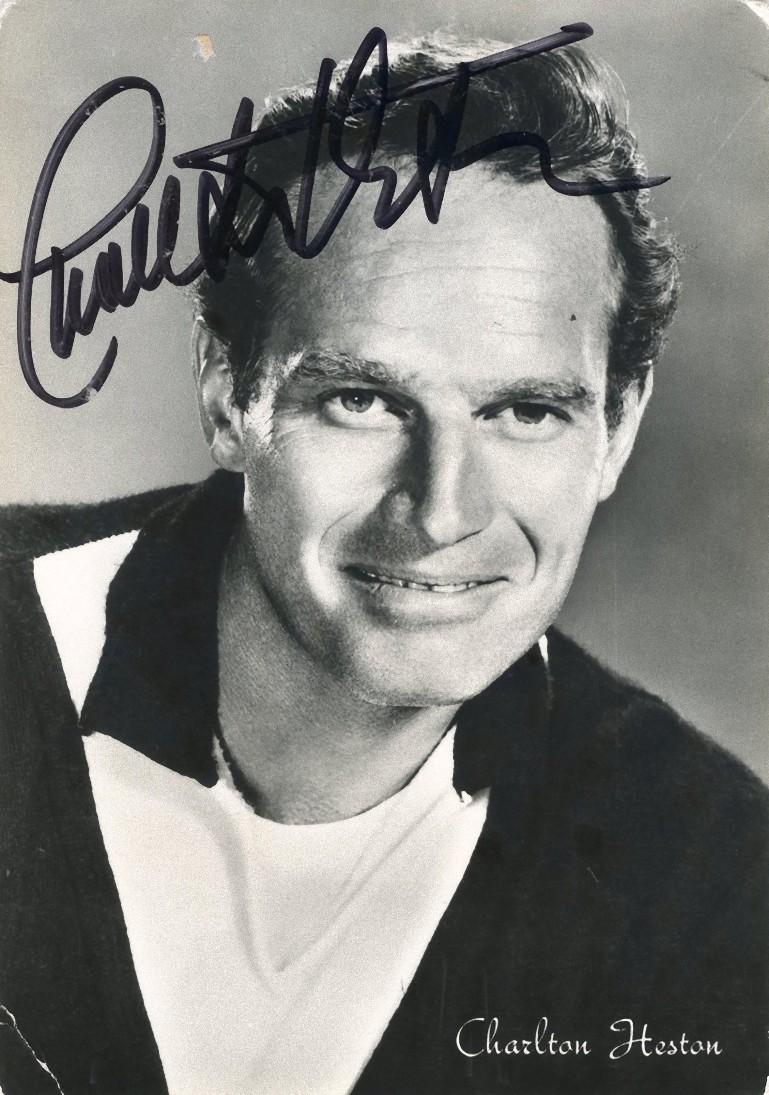 Unknown Portrait Photograph - Autographed Portrait of young Charlton Heston - Vintage b/w Postcard - 1950s