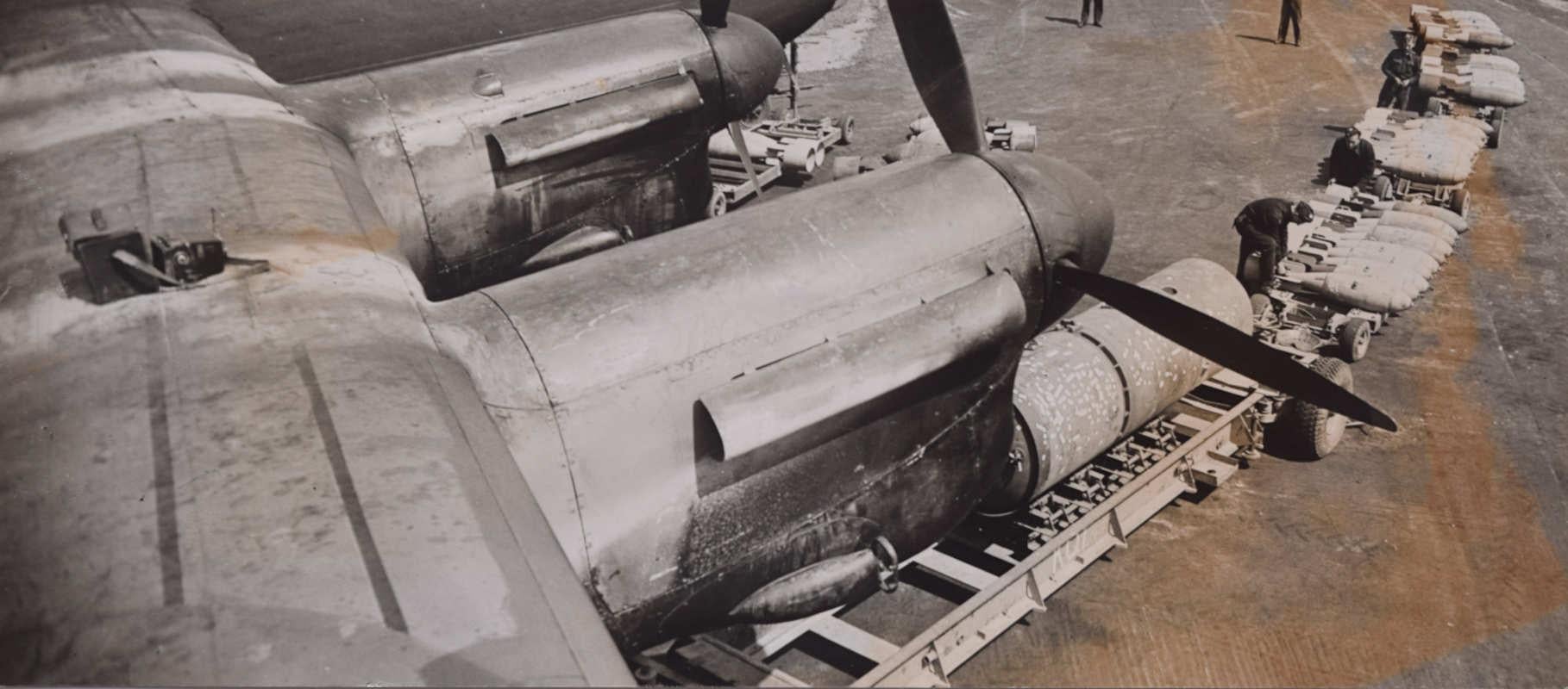 Unknown Black and White Photograph - Avro Lancaster Bomber arming D-Day +1 original 1944 photograph undercarriage 