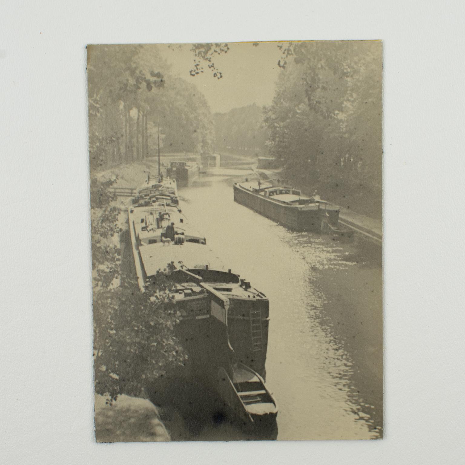 Barges on the Seine River near Paris, 1926 - Silver Gelatin B and W Photography - Brown Black and White Photograph by Unknown
