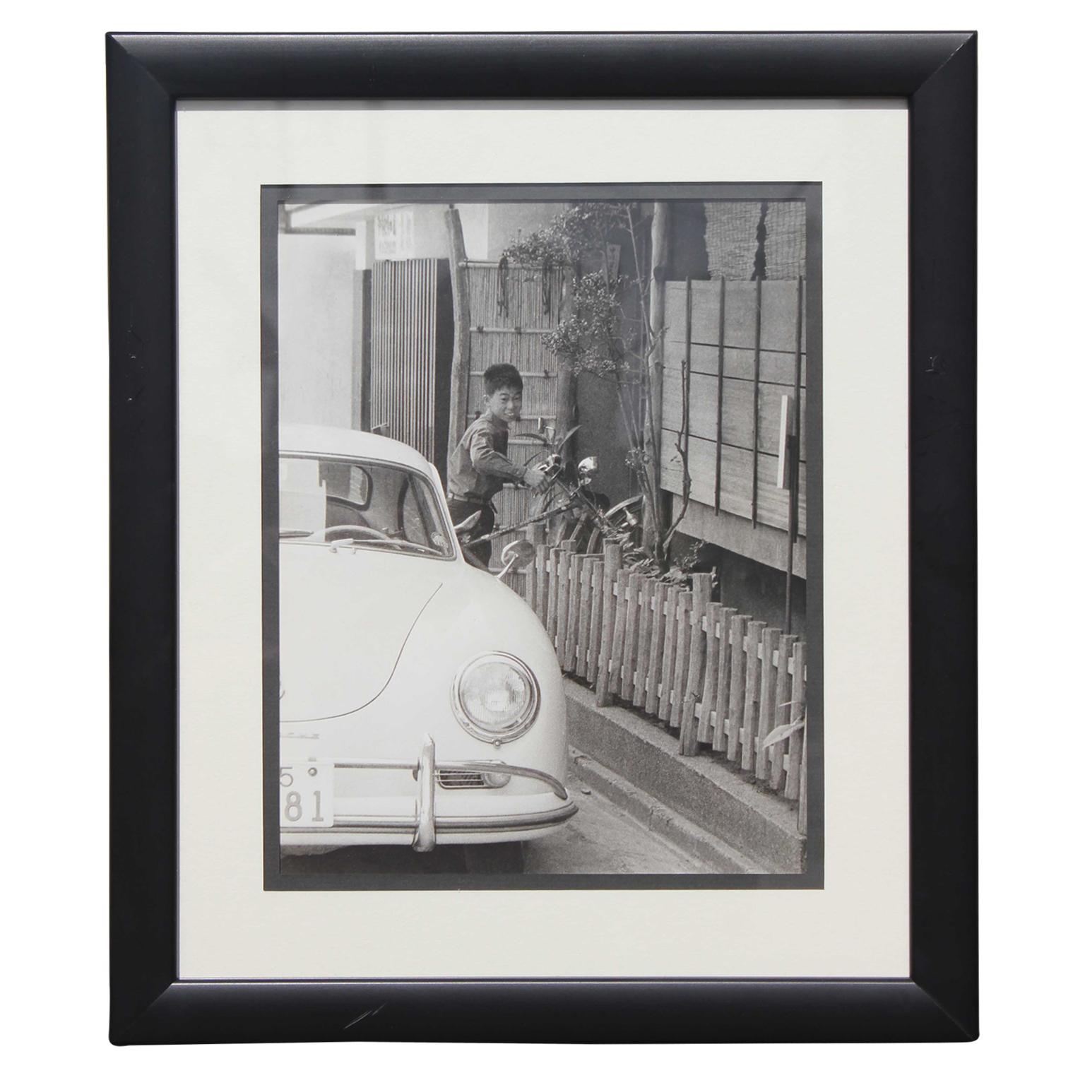Black and White Japanese Photograph of a Porsche and Boy