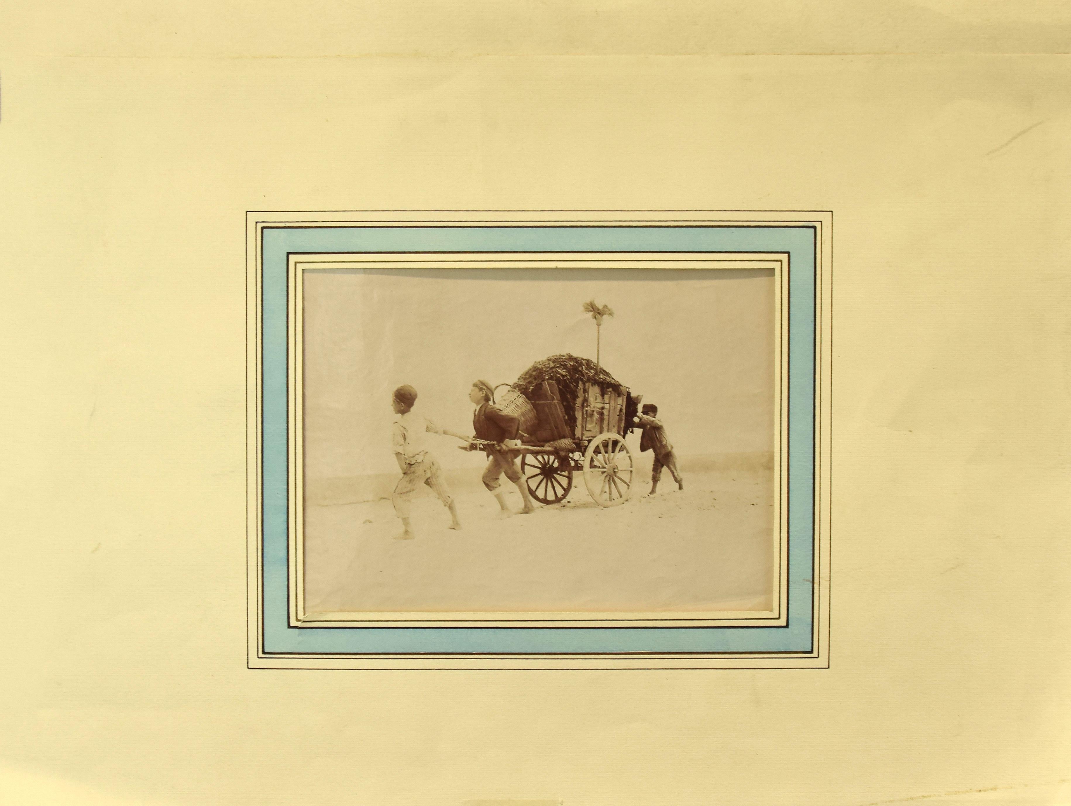 Unknown Figurative Photograph - Boys Pulling a Vagon - Original Photograph - Late 19th Century
