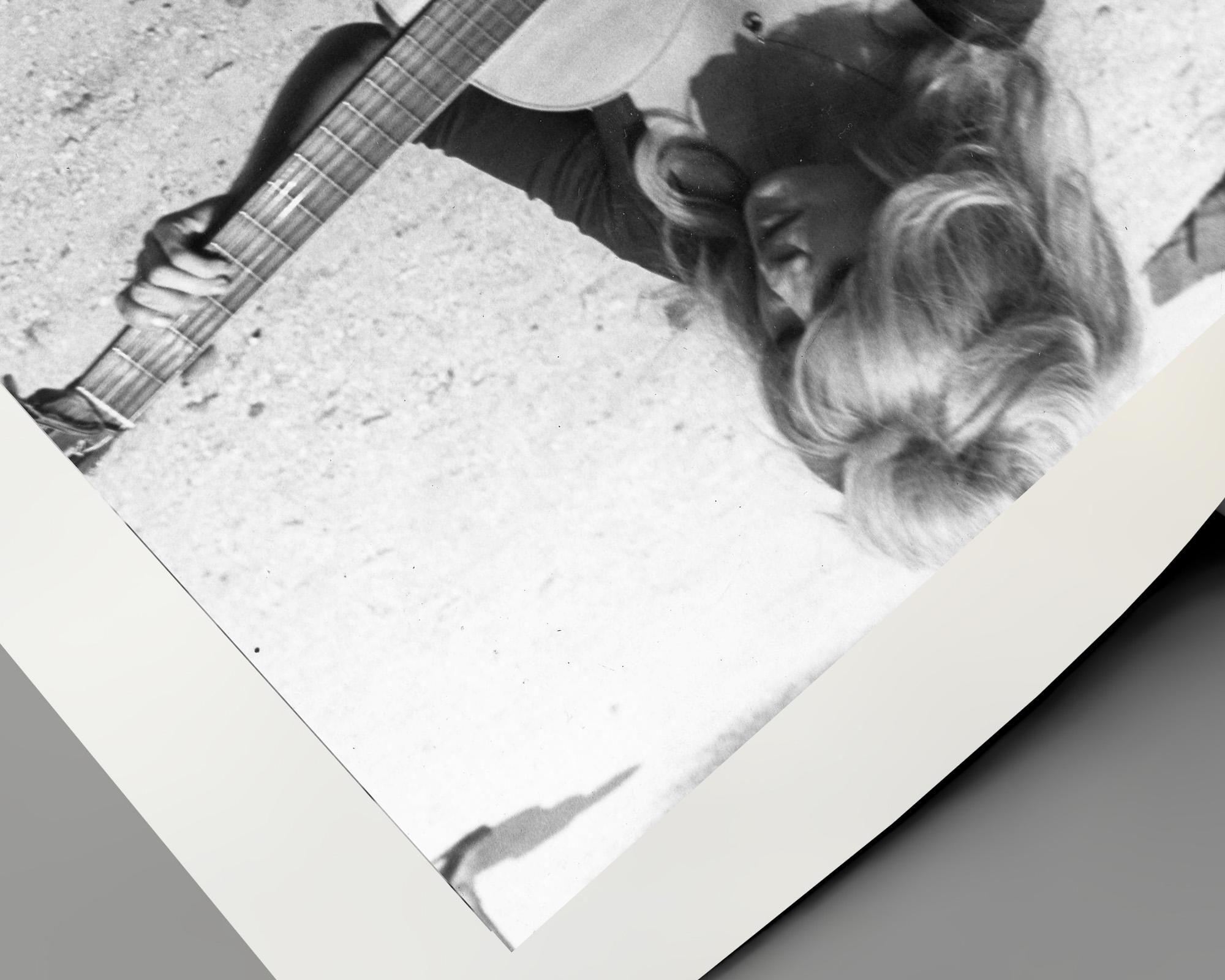 Brigitte Bardot: Beach Guitar - Gray Portrait Photograph by Unknown