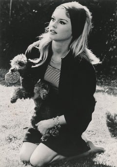 Brigitte Bardot Kneeling with Puppy Fine Art Print