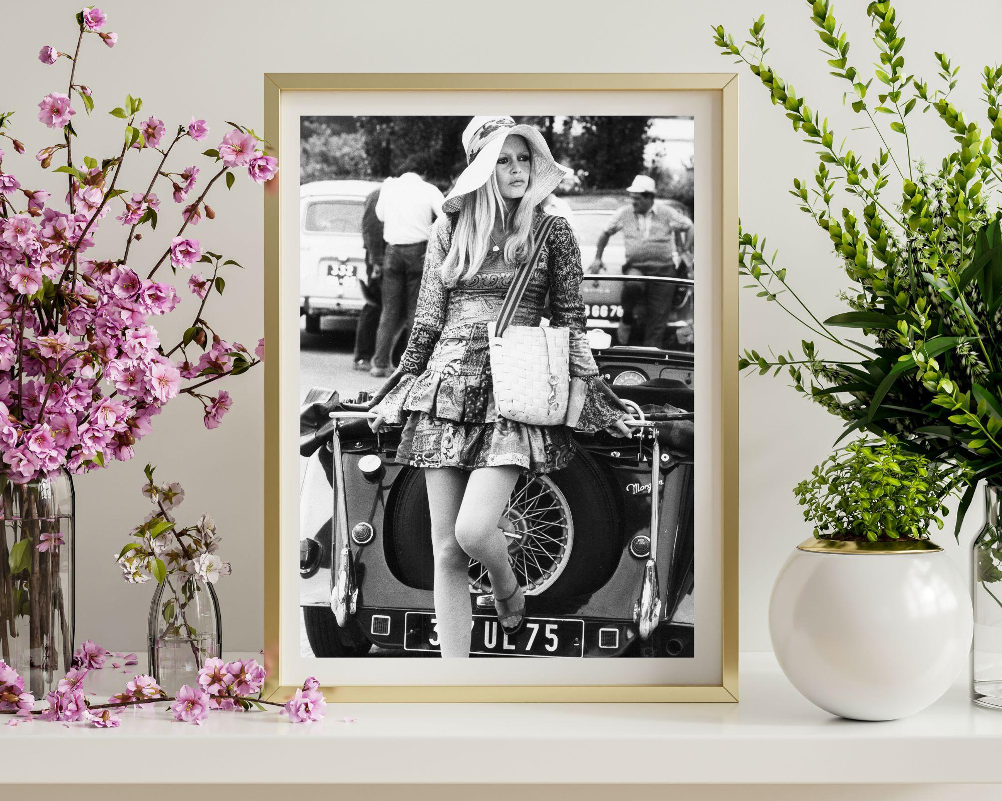 Brigitte Bardot Posed with Vintage Car - Photograph by Unknown