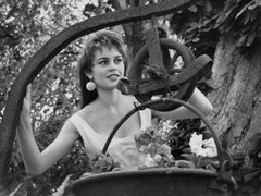 Brigitte Bardot Smiling in a Garden