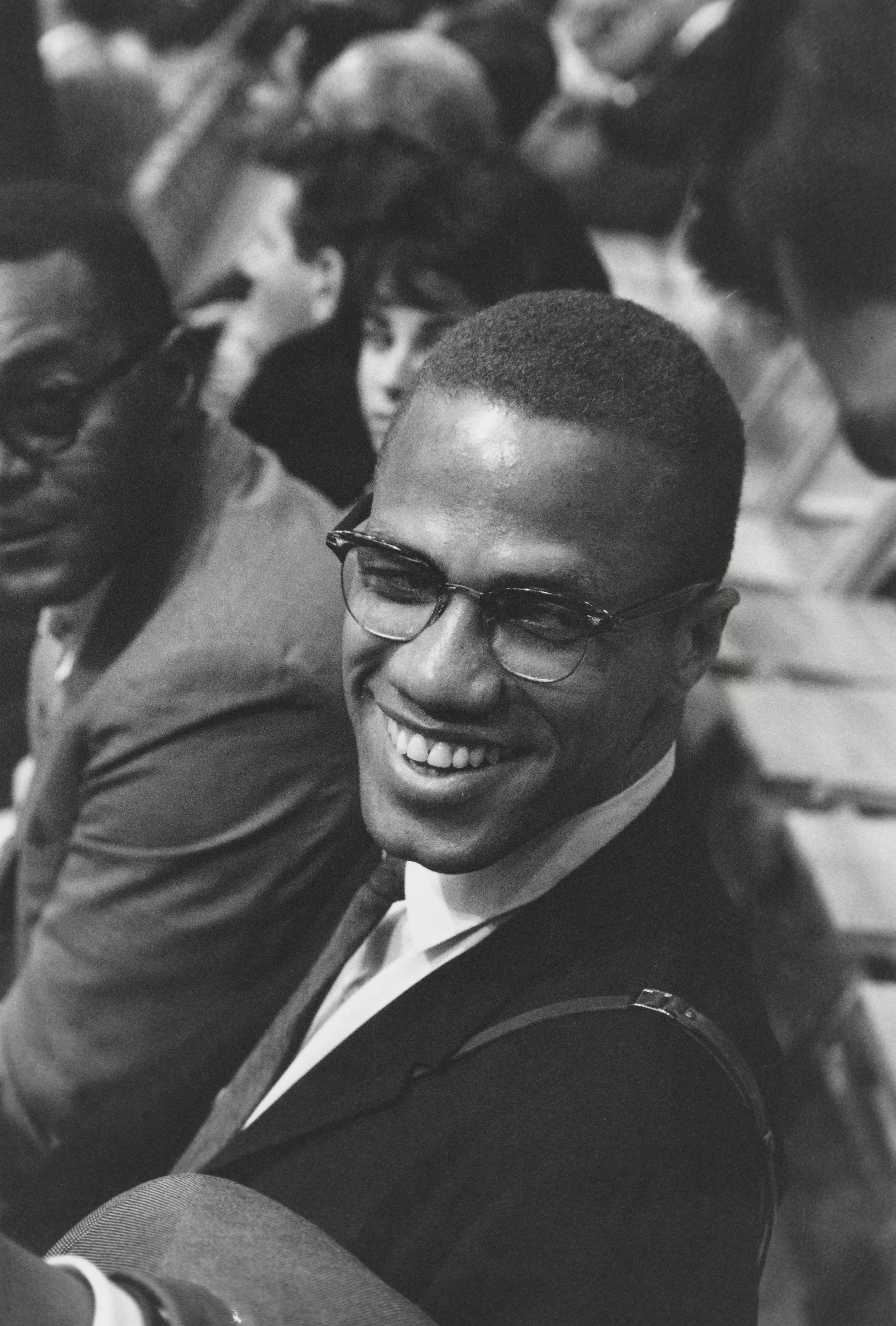 Unknown Portrait Photograph - Candid Malcolm X Smiling at an Ali Fight Fine Art Print