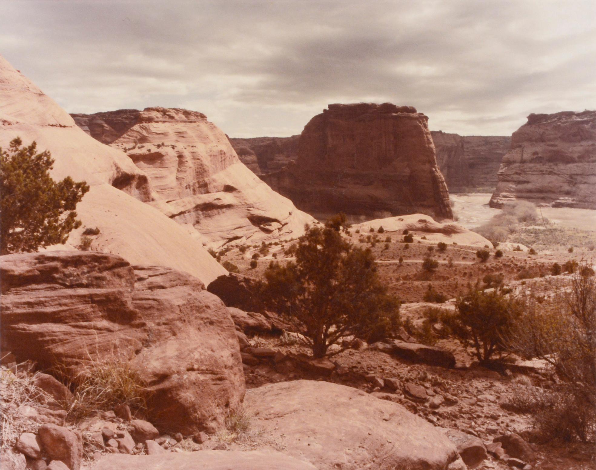 Desert landscape photograph of Canyon de Chelly National Monument by an unknown artist (American, 20th Century). Signed 