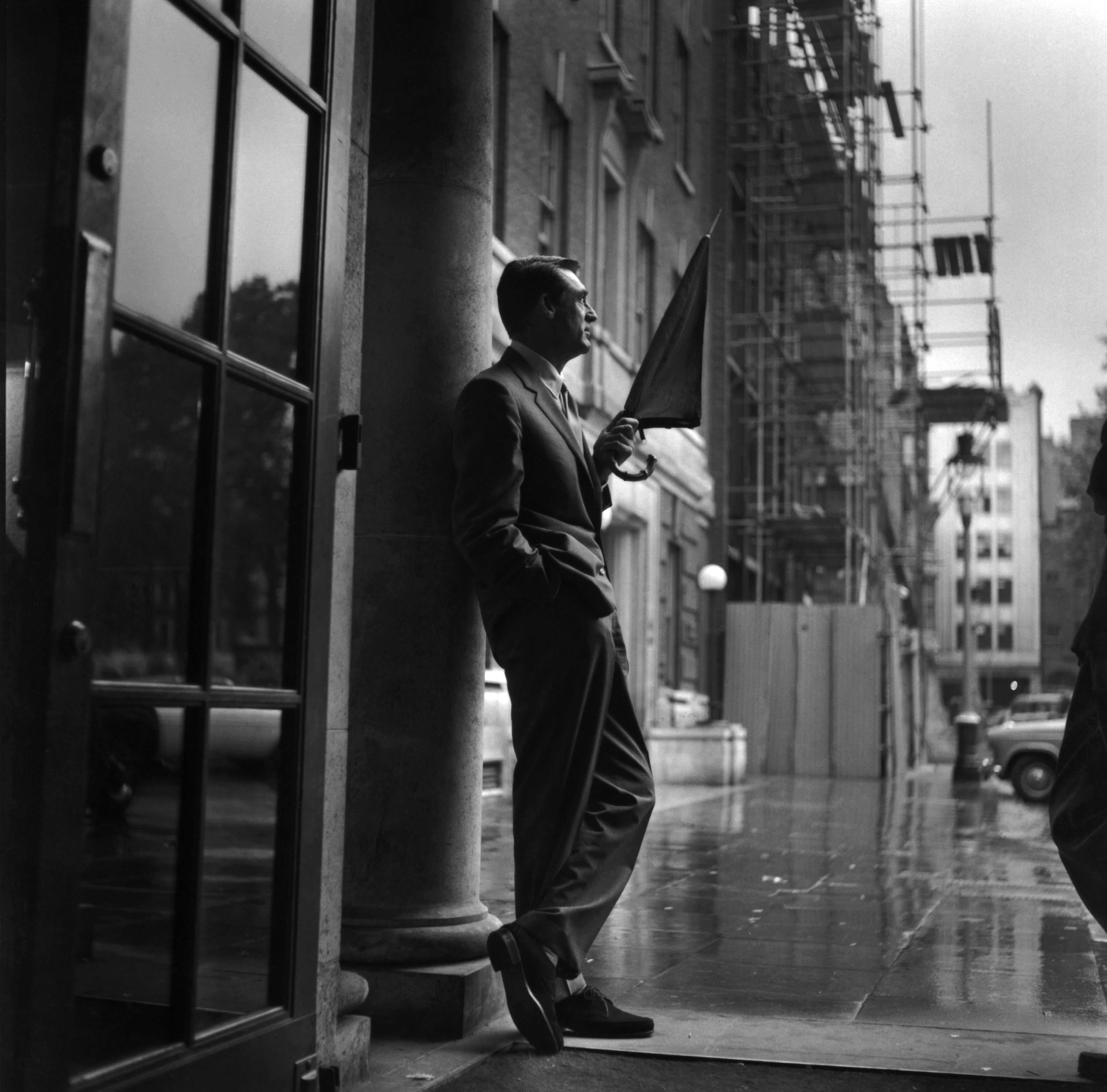 Unknown Black and White Photograph - Cary Grant In Rain (1957) - Silver Gelatin Fibre Print
