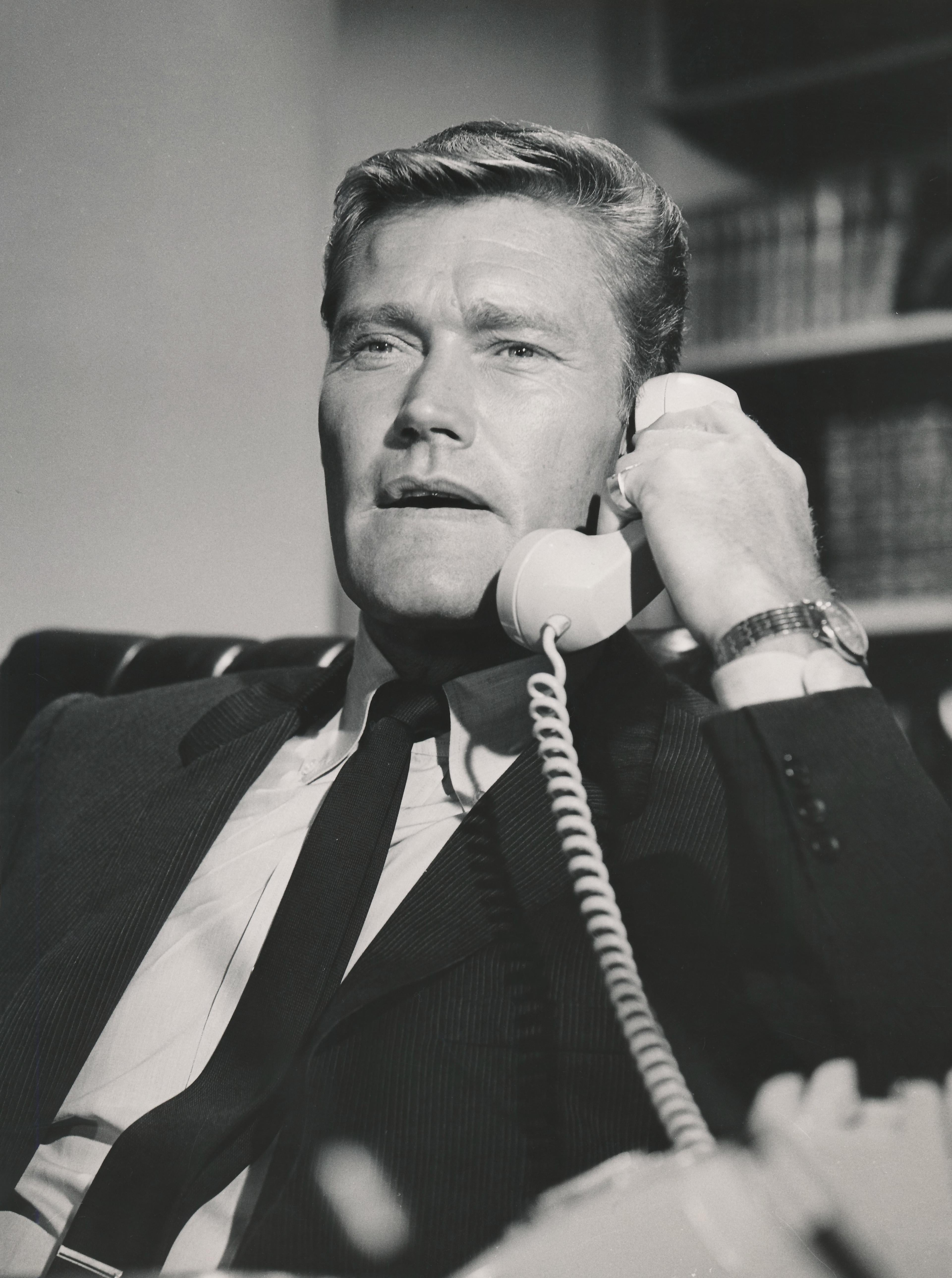 Unknown Black and White Photograph - Chuck Connors Talking on the Telephone Fine Art Print