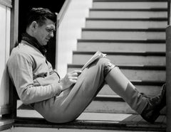 Clark Gable Reclining and Reading Globe Photos Fine Art Print