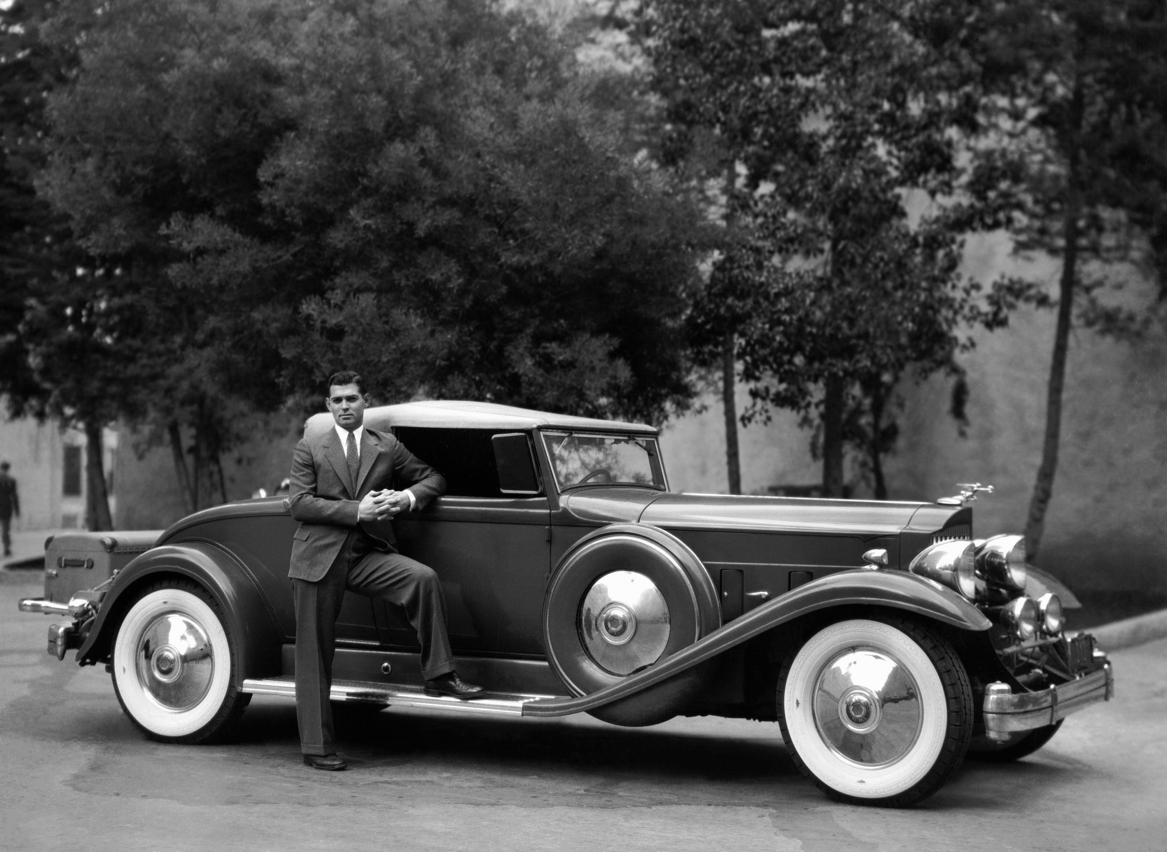 Unknown Portrait Photograph - Clark Gable Standing by Car Globe Photos Fine Art Print