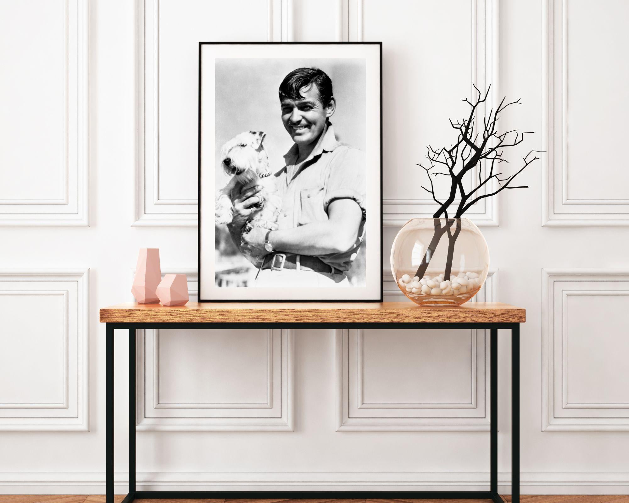 Clark Gable With a Sealyham Terrier - Photograph by Unknown