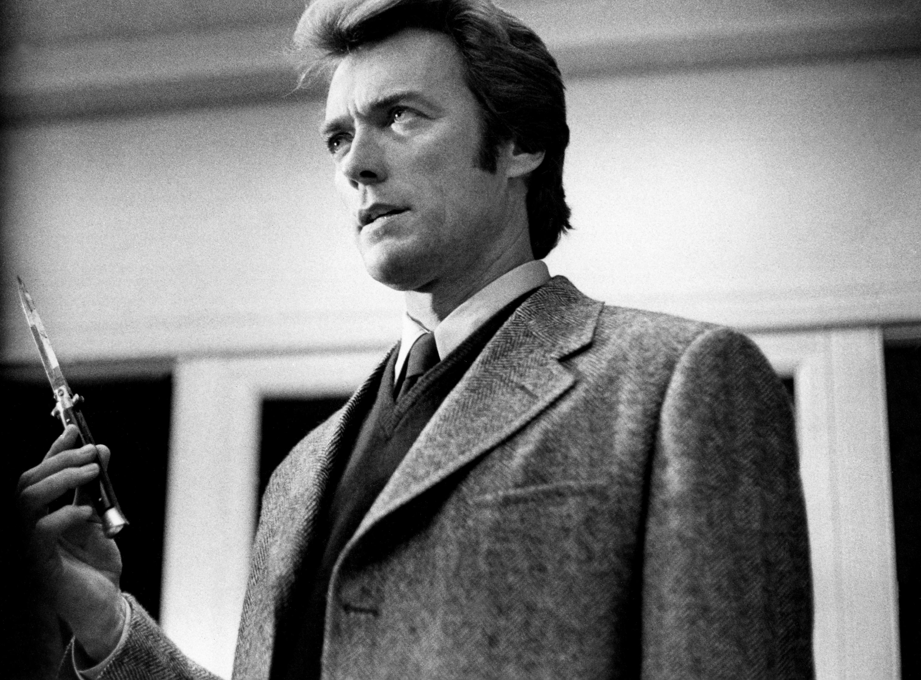 Unknown Black and White Photograph - Clint Eastwood with Butterfly Knife in "Dirty Harry" Globe Photos Fine Art Print