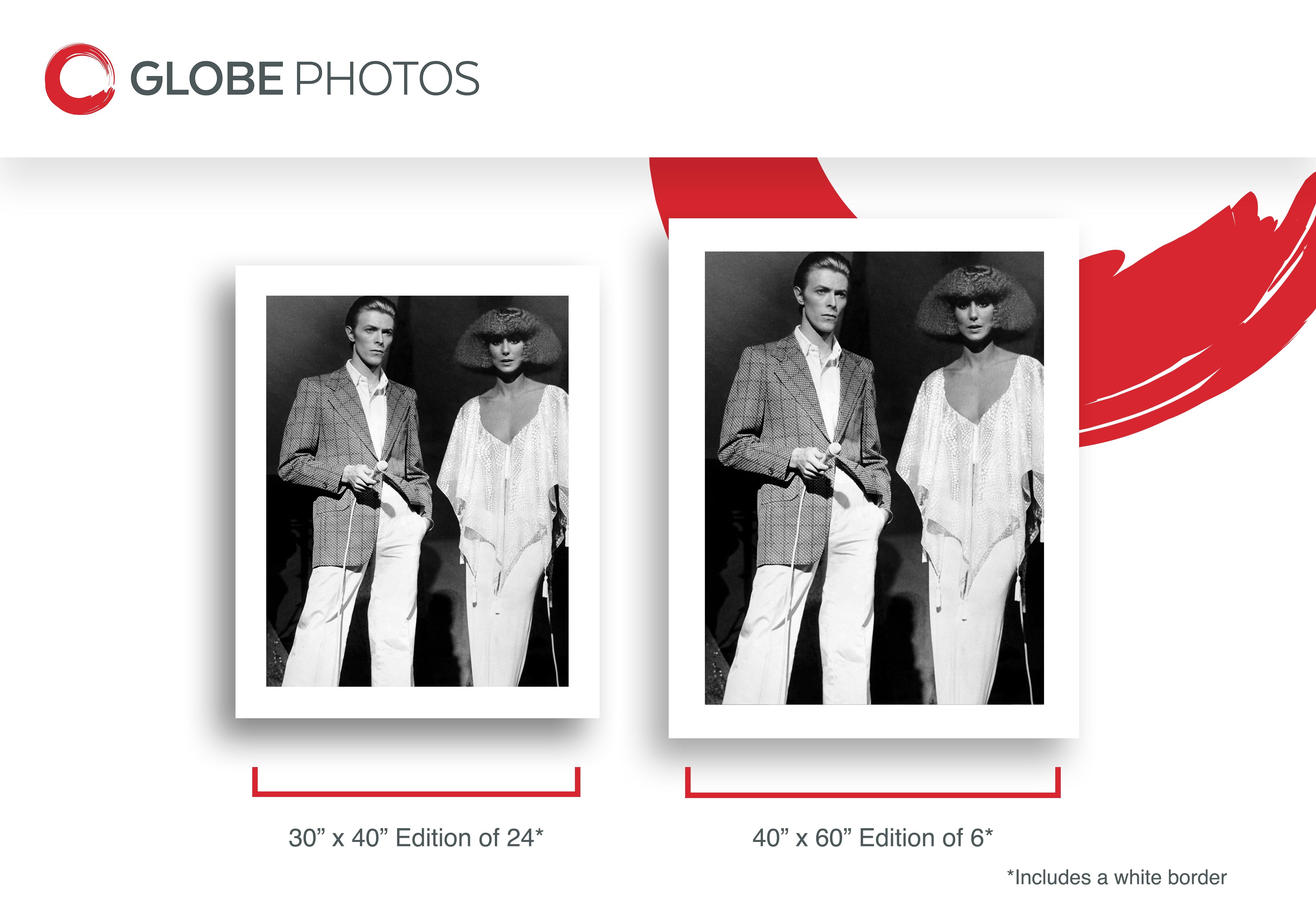 David Bowie and Cher: Fashion Icons of the Age - Black Black and White Photograph by Unknown