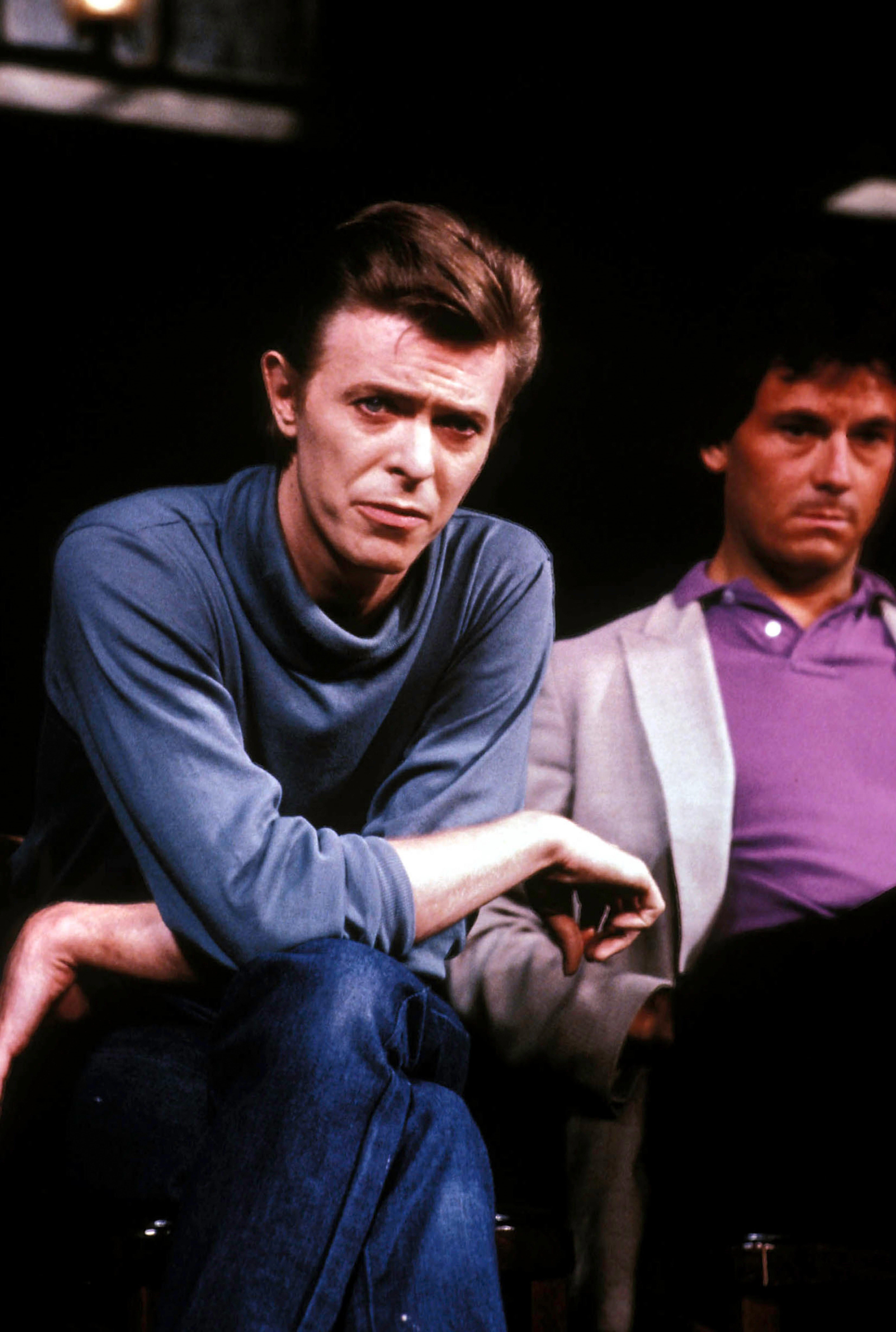 Unknown Color Photograph - David Bowie Candid with Arms Crossed Fine Art Print