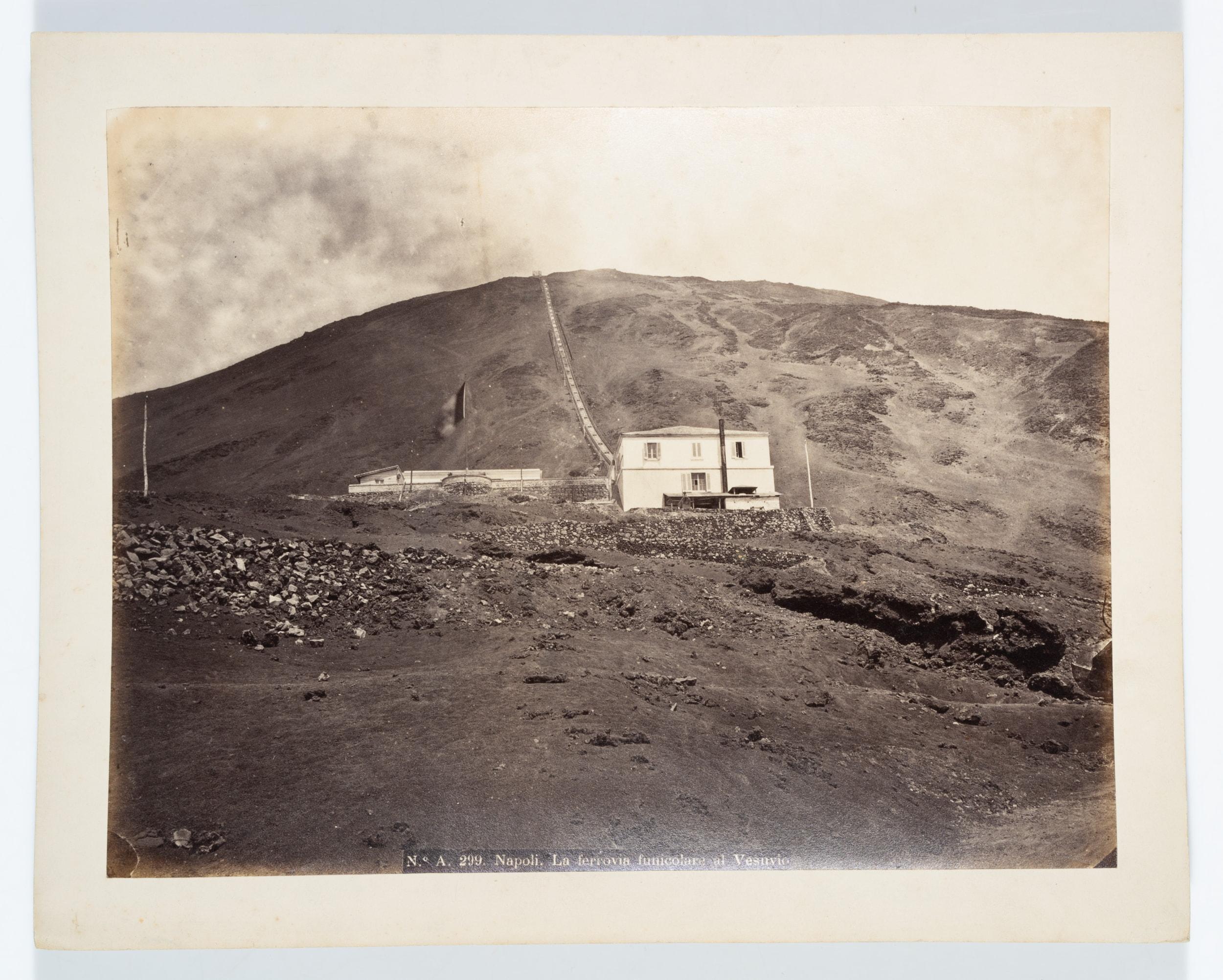 Fratelli Alinari (19th century) Circle: Photograph of the now destroyed cable car up Vesuvius, c. 1880, albumen paper print

Technique: albumen paper print, mounted on Cardboard

Inscription: At the lower part inscribed in the printing plate: 