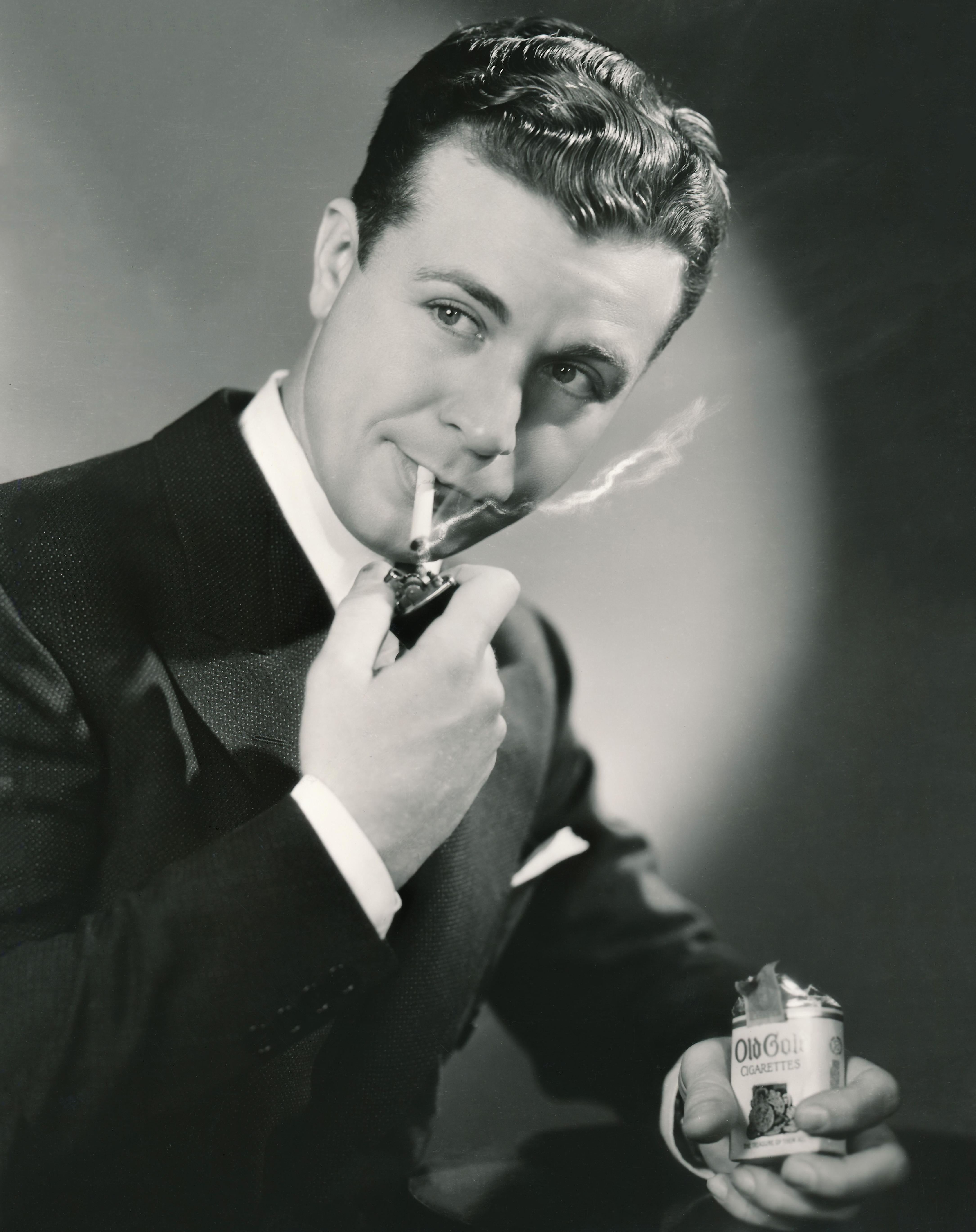 Unknown Black and White Photograph - Dick Powell Smoking Fine Art Print