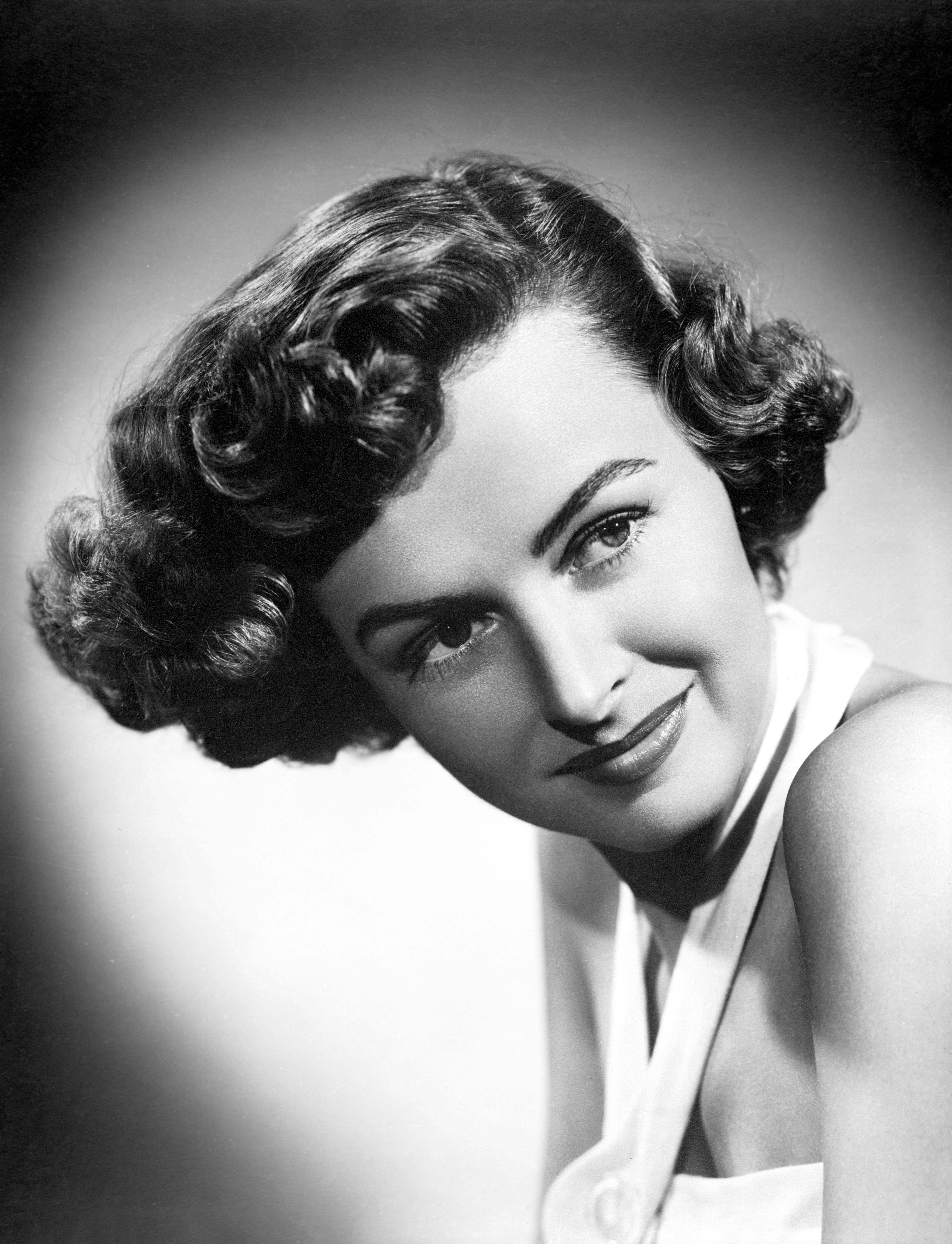 Unknown Black and White Photograph - Donna Reed Smiling in the Studio Movie Star News Fine Art Print
