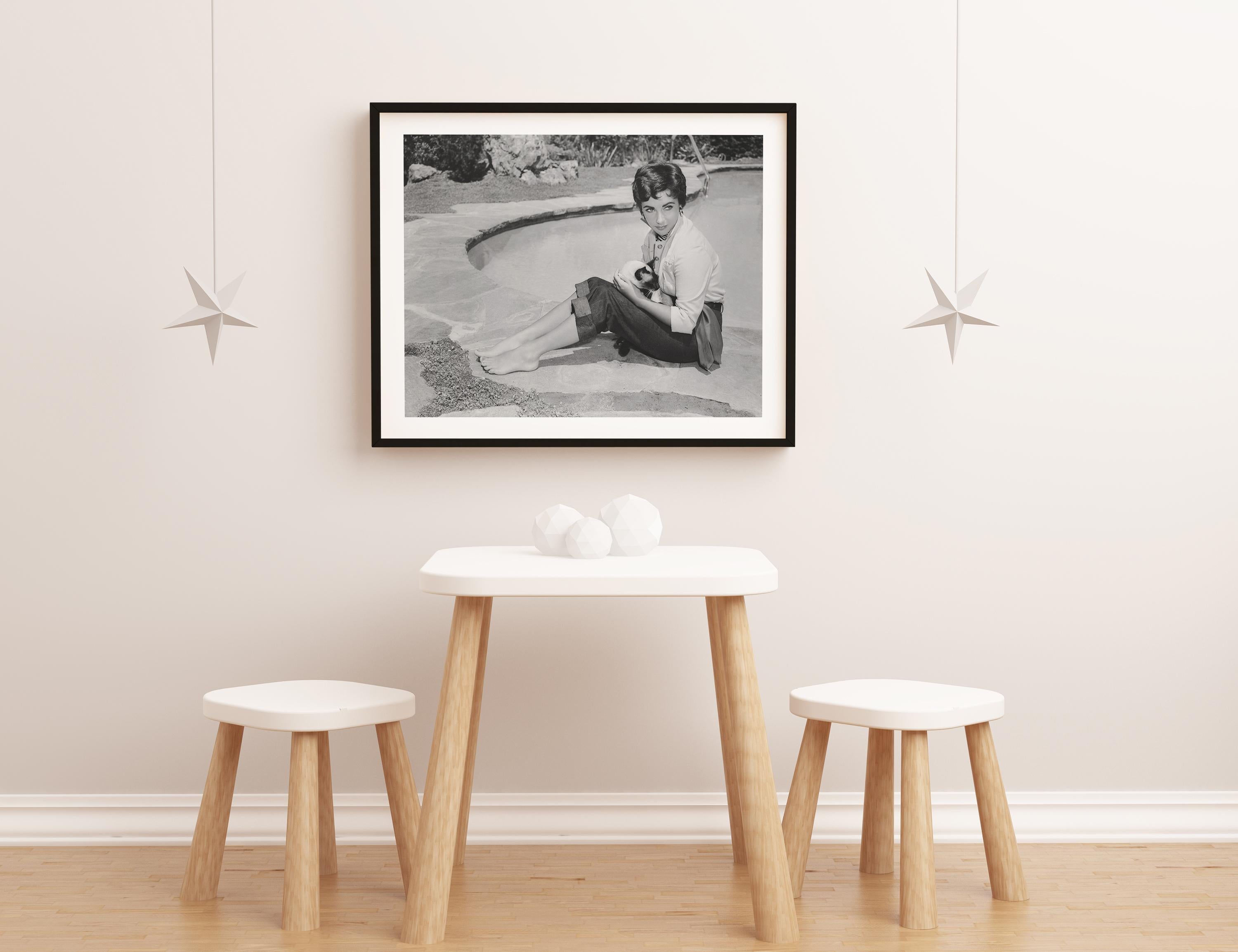 Elizabeth Taylor Holding Cat Poolside Fine Art Print - Gray Black and White Photograph by Unknown
