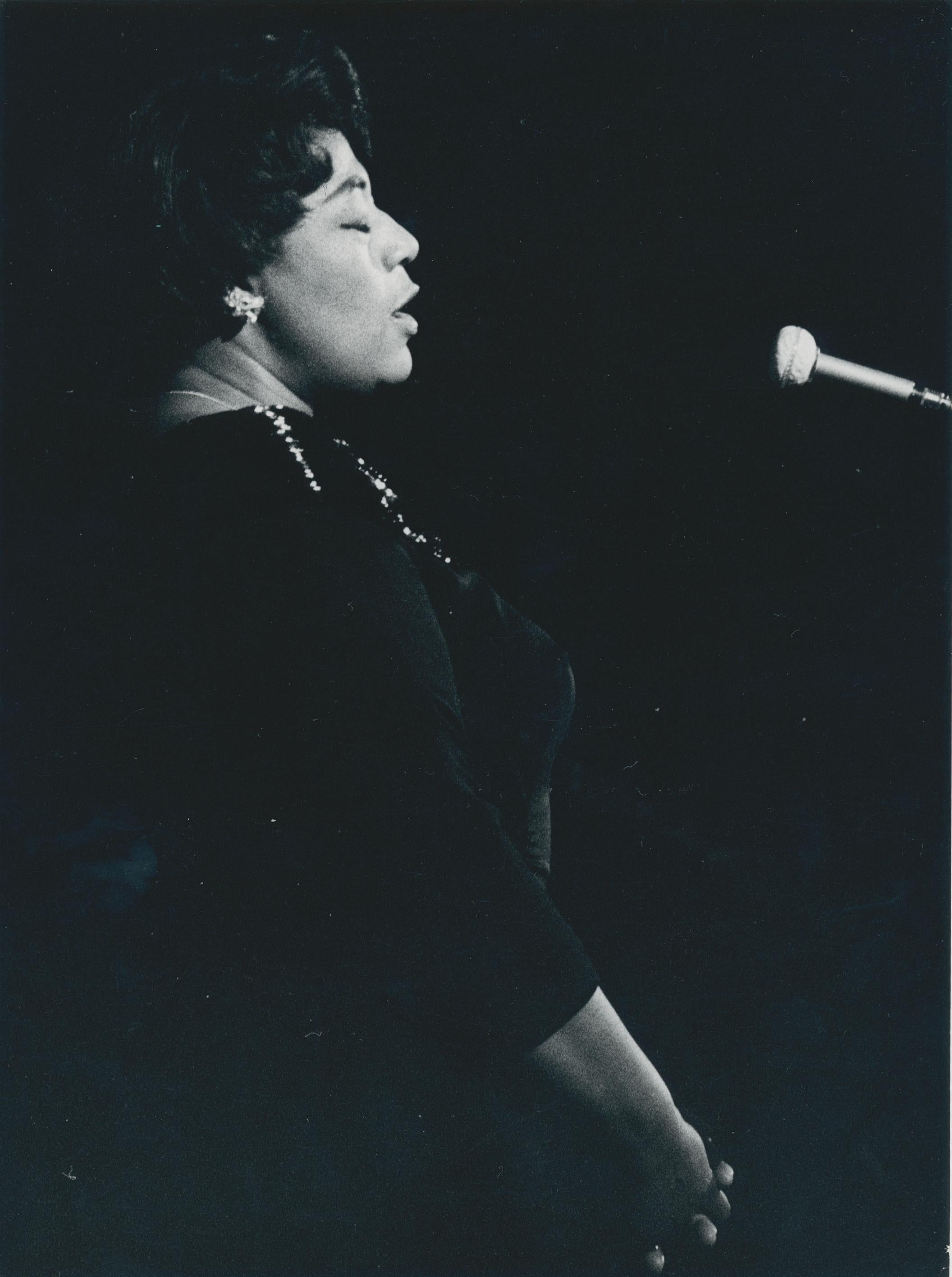 Unknown Black and White Photograph - Ella Fitzgerald on stage, black and white, unknown Date