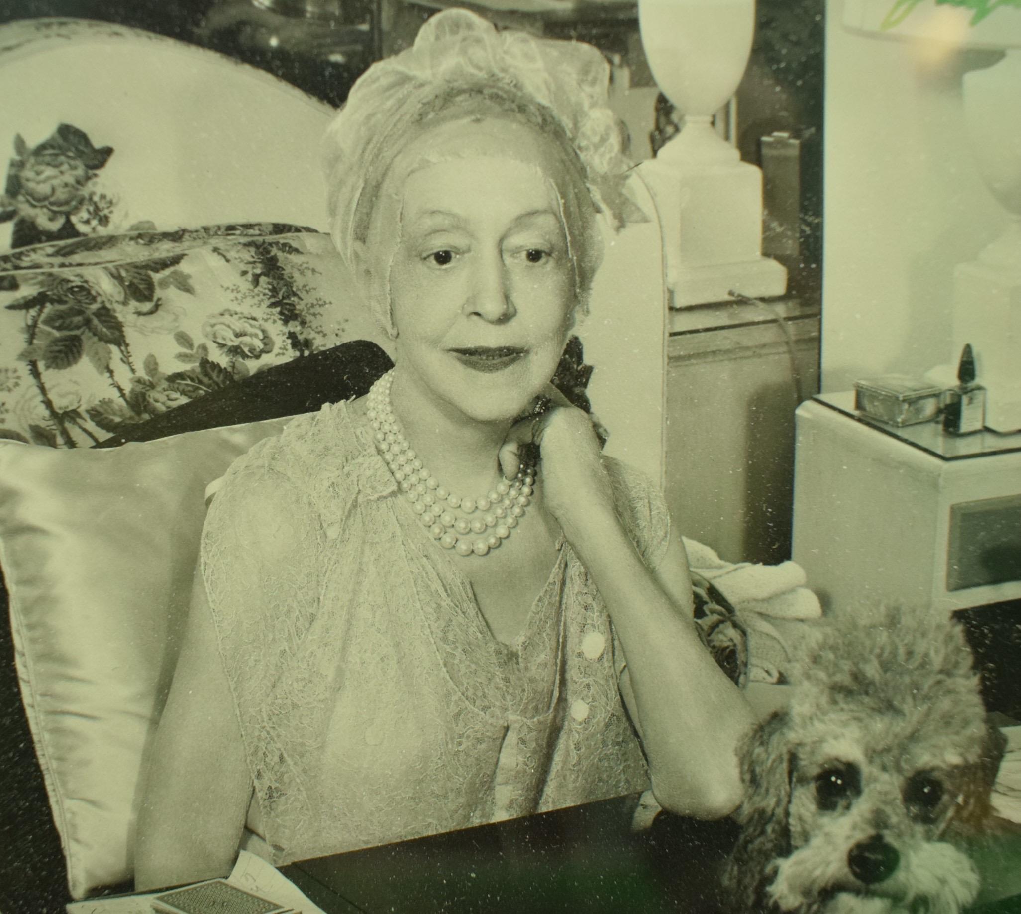 Elsie de Wolfe & Her Poodle, Jacques 1949 B&W Photo in Gilt Bamboo Frame - Brown Figurative Photograph by Unknown