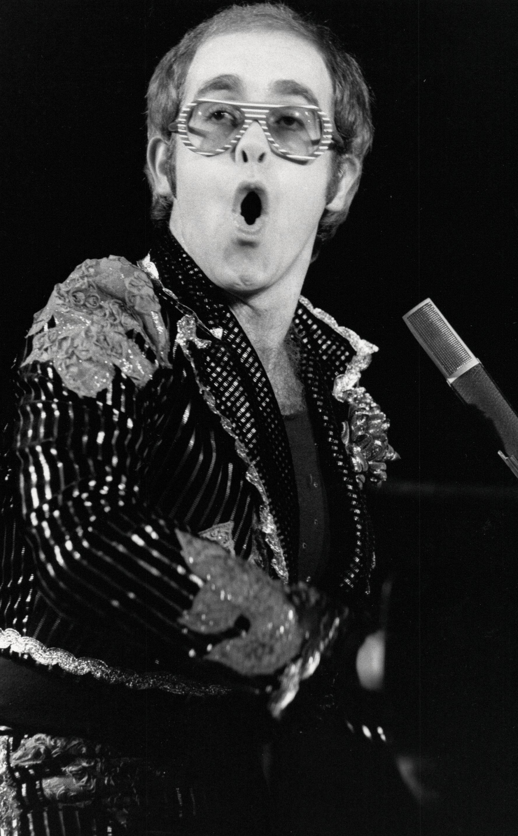 Unknown Portrait Photograph - Elton John Performing in Striped Glasses Vintage Original Photograph