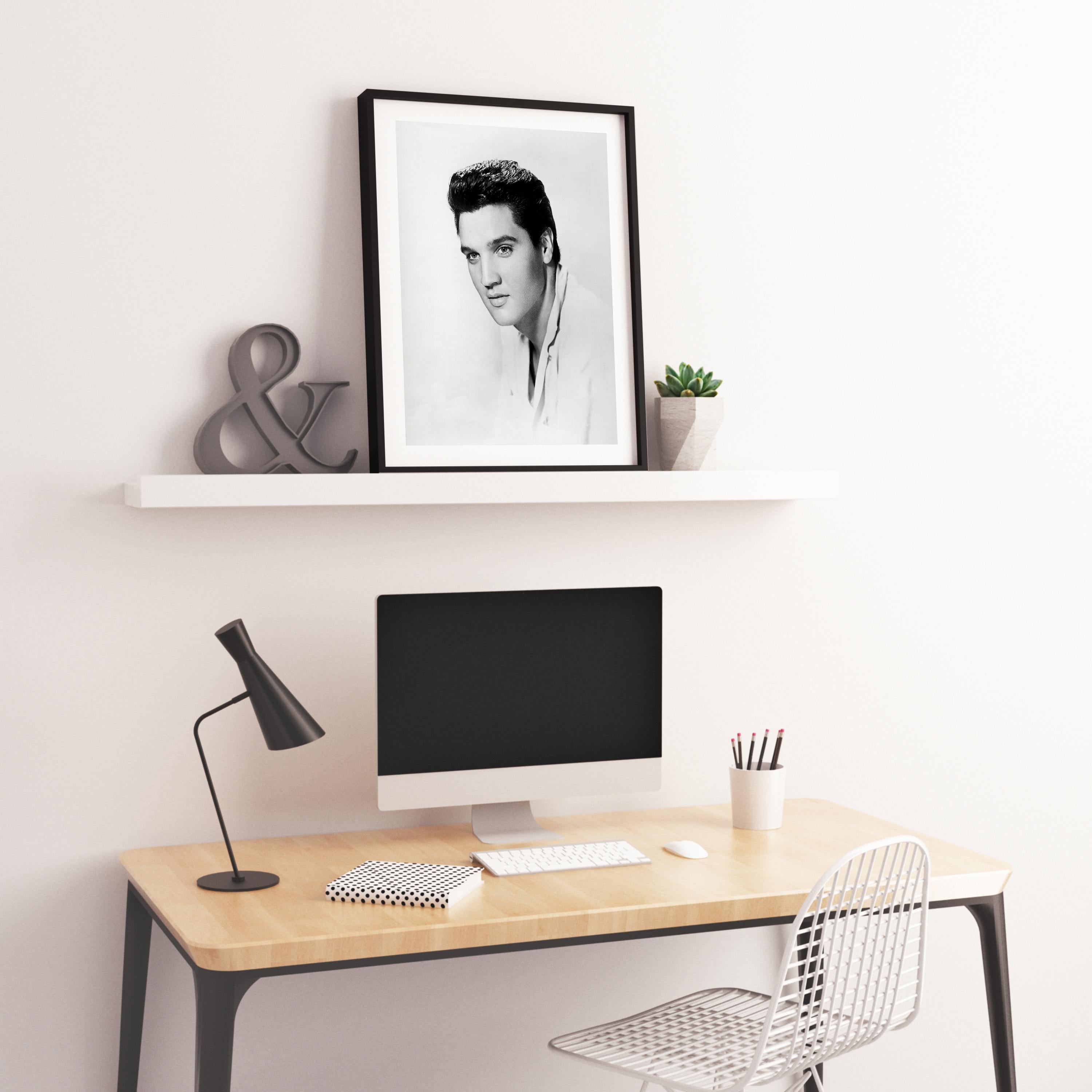 Elvis Presley: Handsome Star on White Globe Photos Fine Art Print - Gray Black and White Photograph by Unknown