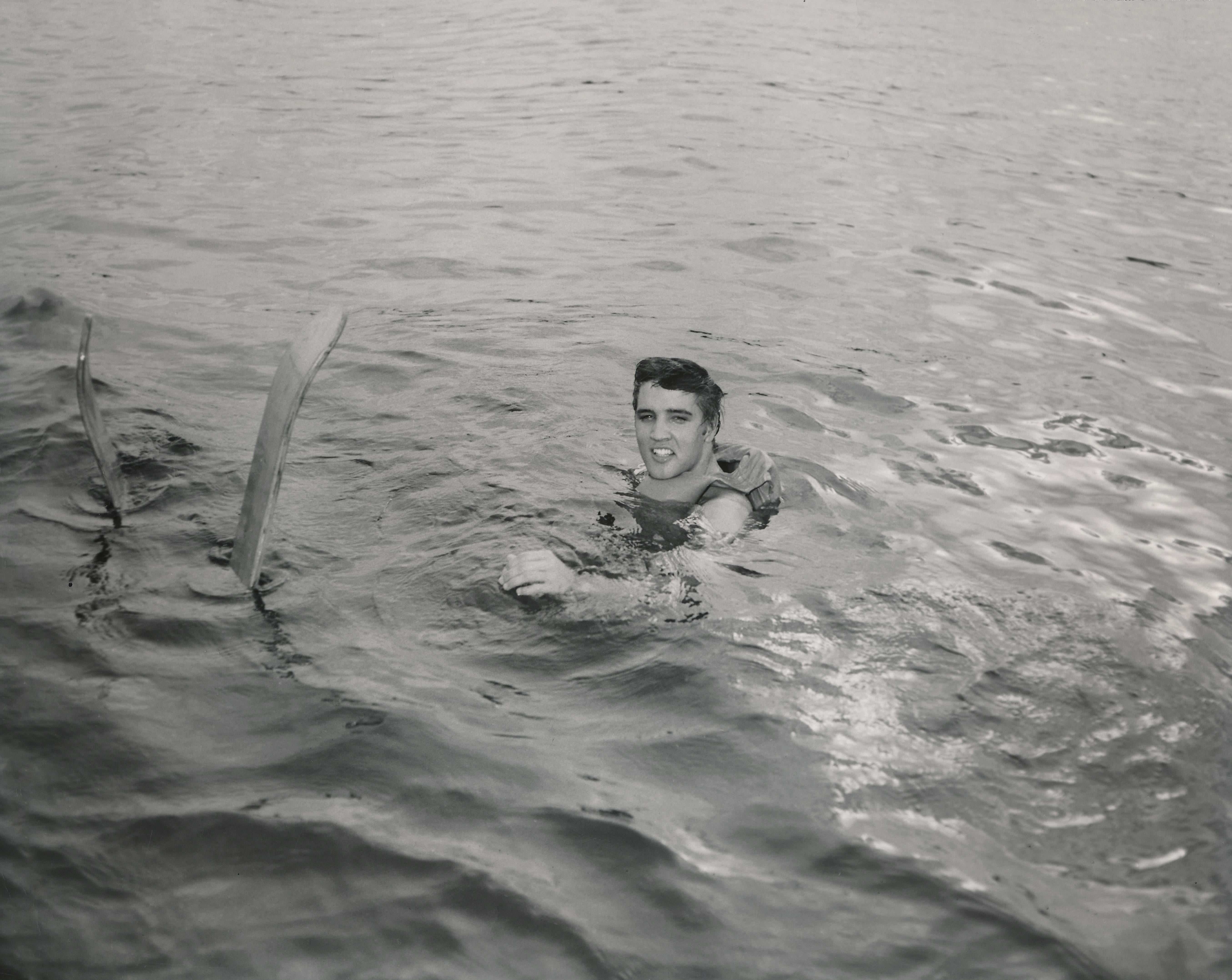 Unknown Black and White Photograph - Elvis Presley Swimming Fine Art Print