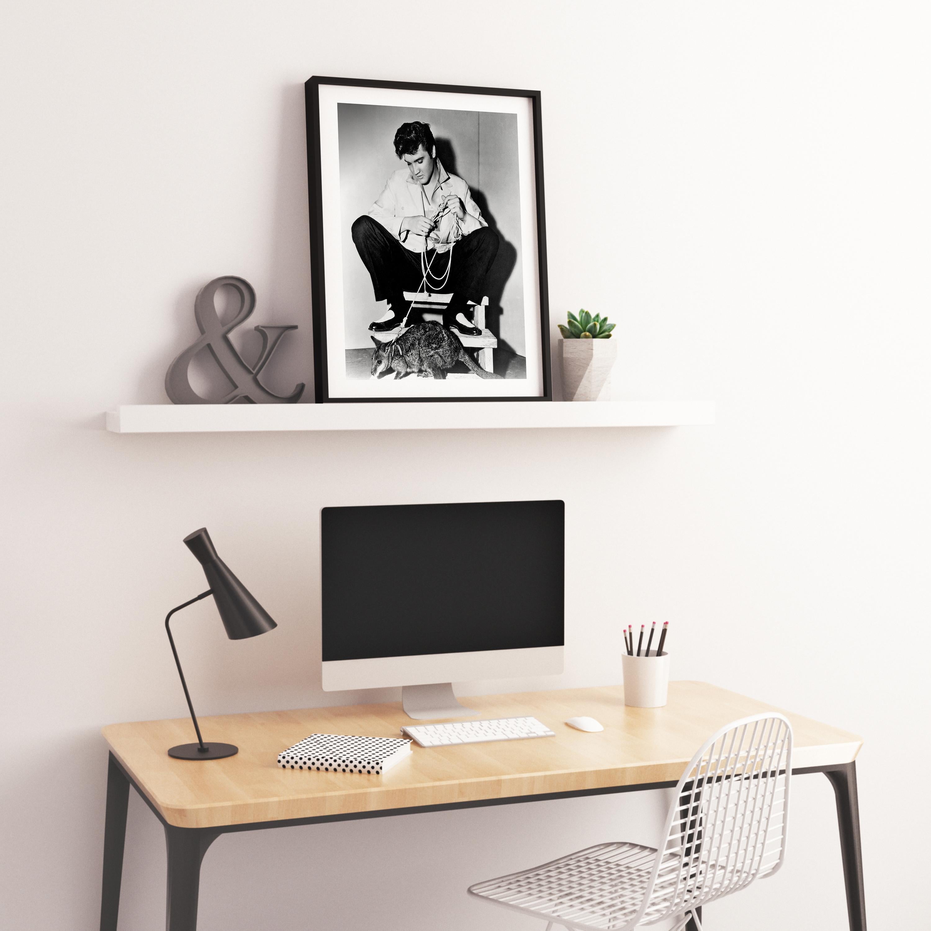 Elvis Presley: The King with His Kangaroo Globe Photos Fine Art Print - Gray Black and White Photograph by Unknown