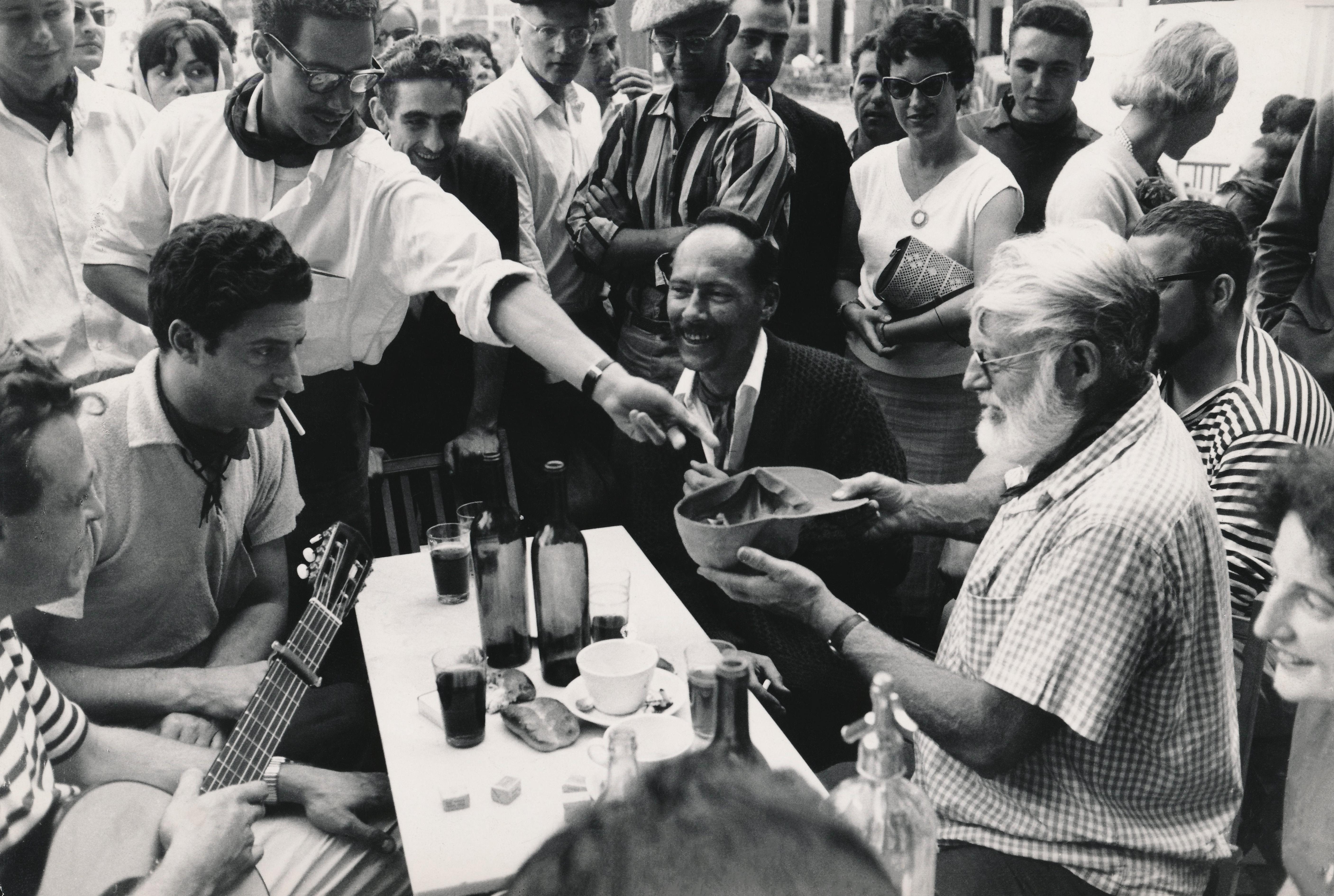 Unknown Black and White Photograph - Ernest Hemingway with the Locals in Spain Fine Art Print