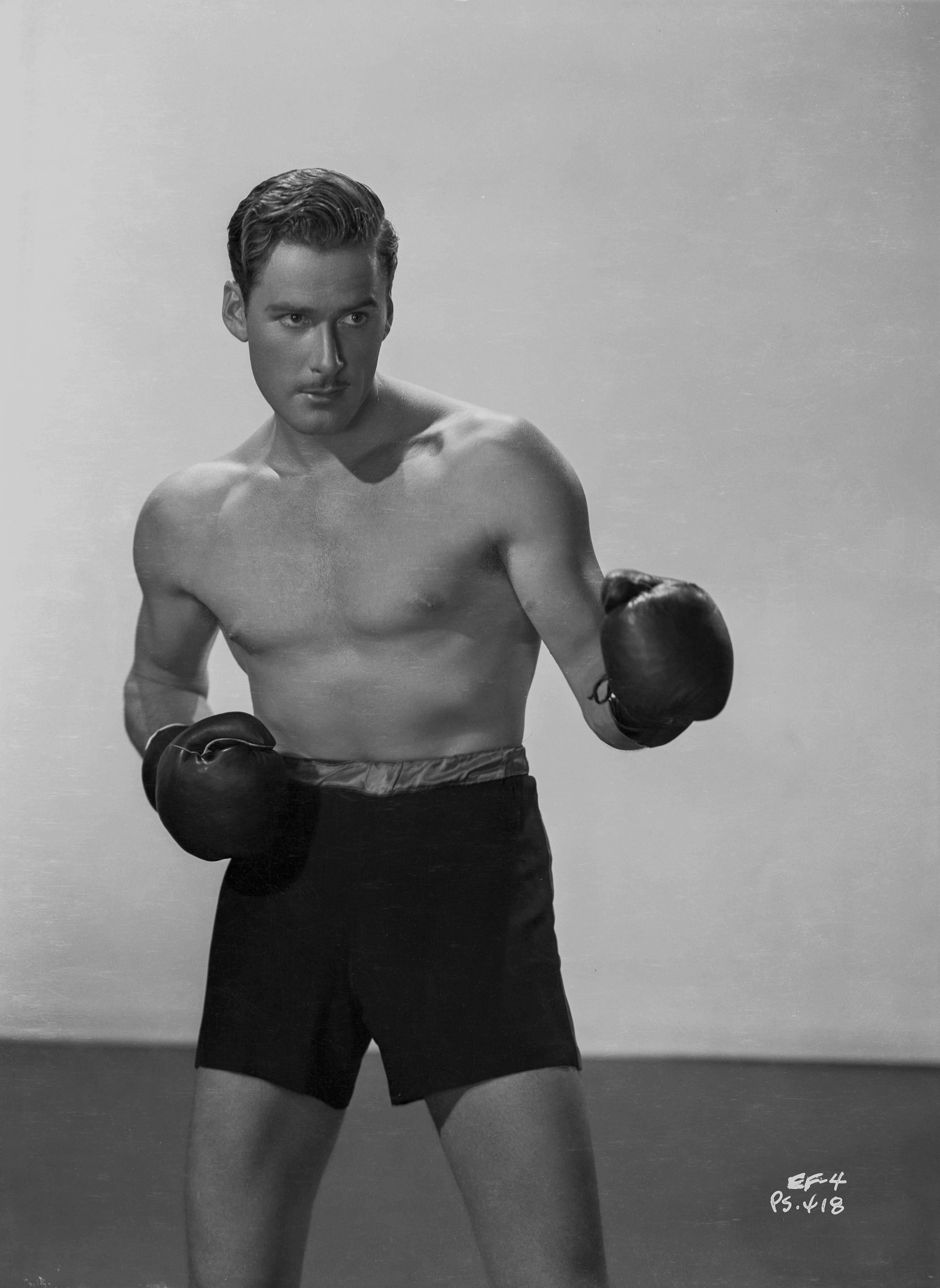 Unknown Black and White Photograph - Errol Flynn Boxing Fine Art Print