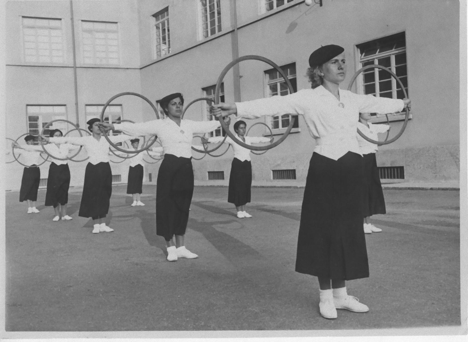 Unknown Figurative Photograph - Fascism in Italy - Exercises with Wooden Hoops - Vintage b/w Photo - 1934 ca.