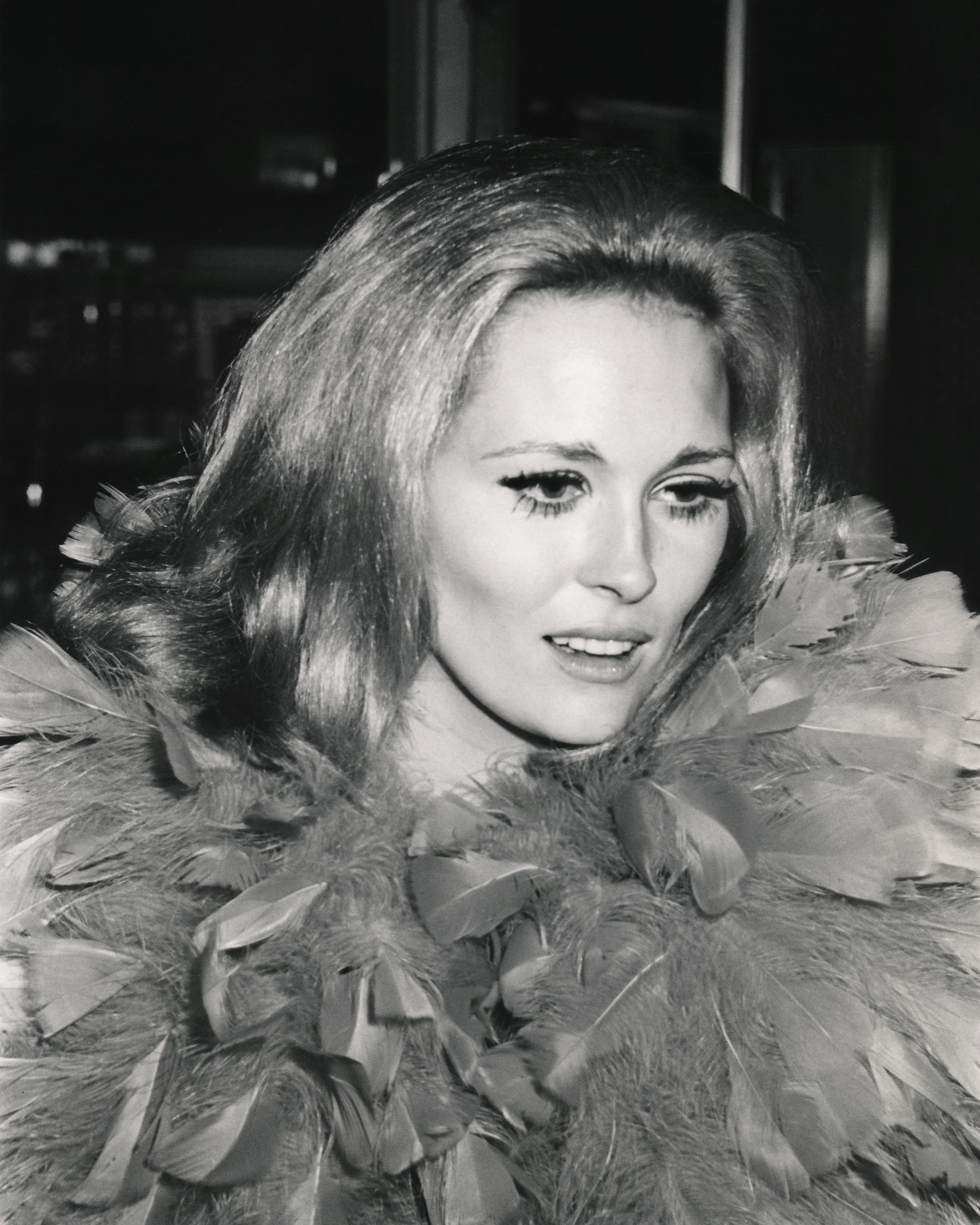 Unknown Portrait Photograph - Faye Dunaway Candid in Feathers Fine Art Print