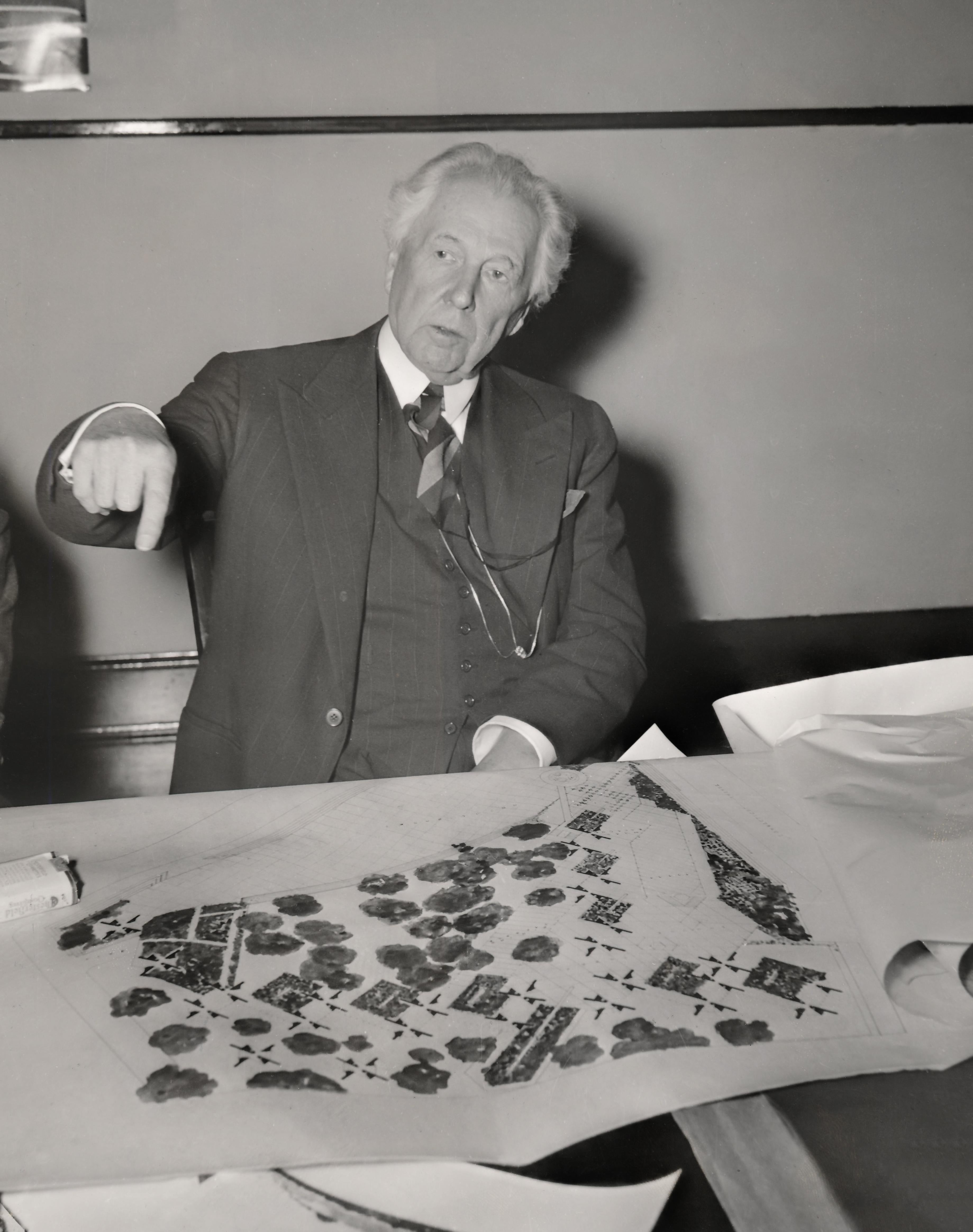 Unknown Portrait Photograph - Frank Lloyd Wright With his Plans Fine Art Print