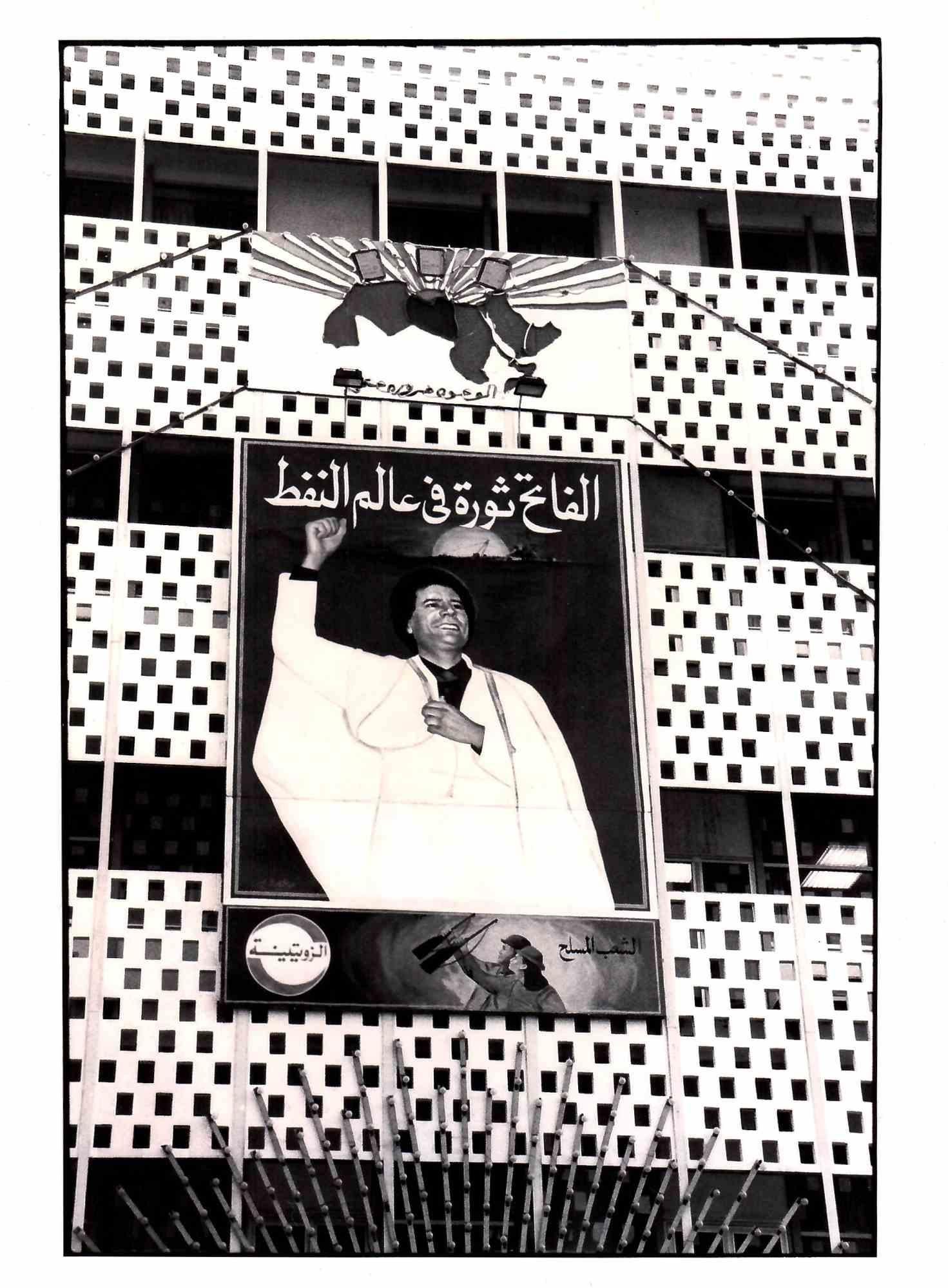 Unknown Portrait Photograph - Gaddafi Revolutionary Poster on a Building - Vintage B/W photo - Early 1970s